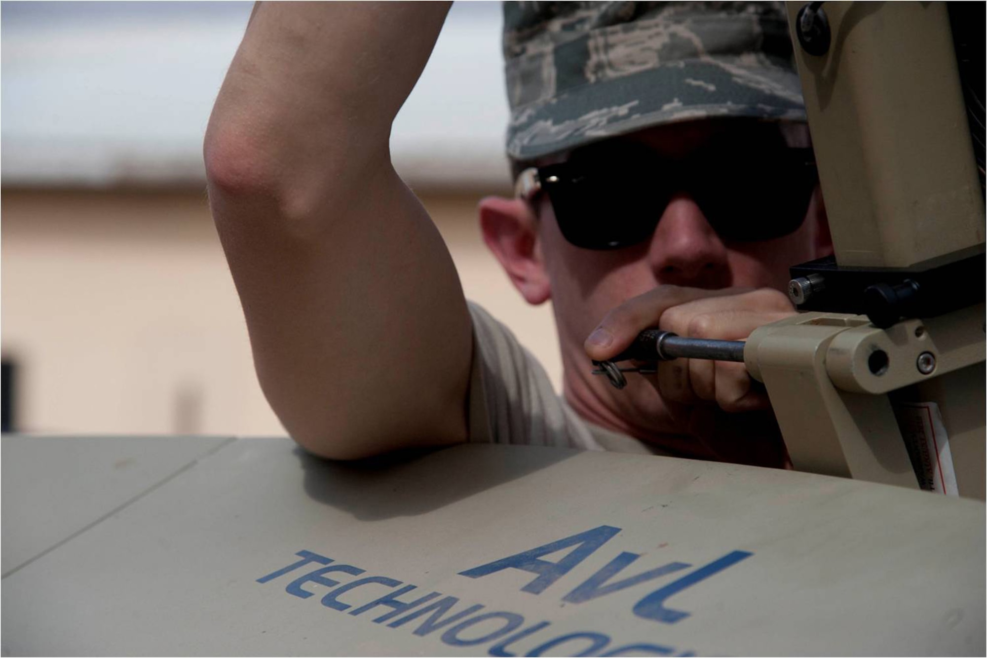 Tactical Networking technician Senior Airman Robert Morrison, assigned to Combined Joint Task Force –Horn of Africa’s communications directorate, maintains an access point satellite terminal here April 19, 2012. These terminals allow for mobile use for computers and phones by U.S. personnel in their area of operation, anywhere in the world. (U.S. Air Force photo by Staff Sgt. Andrew Caya)