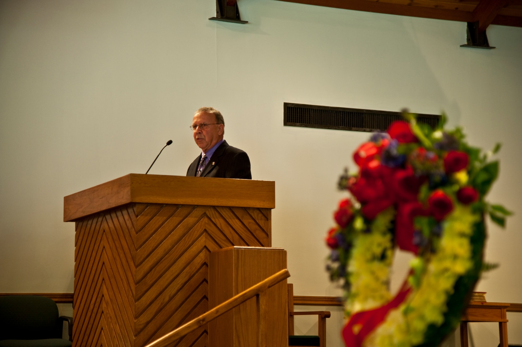 Retired U.S. Air Force Col. Bob Brenci, aircraft commander of Dragon One, speaks to the audience during the Operation Eagle Claw 32nd anniversary memorial service in the base chapel on Hurlburt Field, Fla., April 24, 2012. Brenci gave a historic account of the events that took place April 24, 1980 during Operation Eagle Claw. 
(U.S. Air Force photo/Senior Airman John Bainter)  