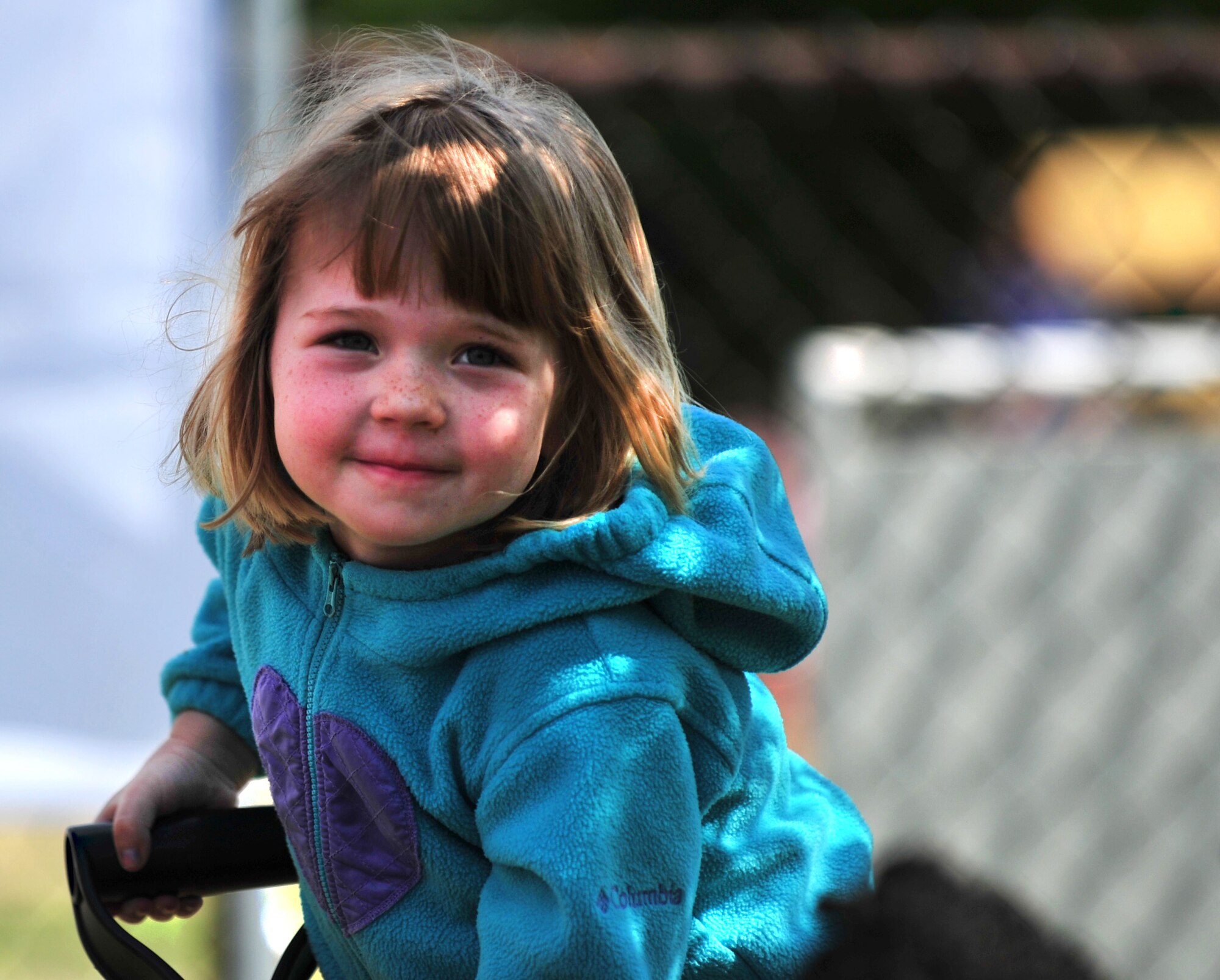 Emily Croft shovels dirt during a tree planting ceremony at the Langley Air Force Base, Va., child development center, April 25, 2012. Emily, as well as other children from the CDC, planted a tree in honor of National Arbor Day. (U.S. Air Force photo by Senior Airman Jarad A. Denton/Released) 
