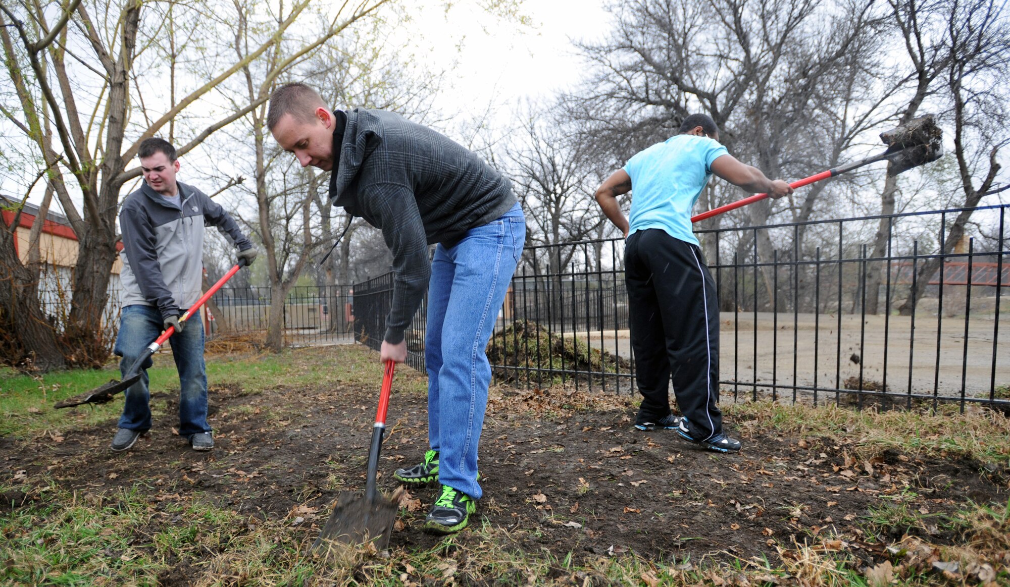 MINOT, N.D. -- Airmen from the 91st Missile Security Forces Squadron  volunteer their time to help clean up the Roosevelt Park Zoo in Minot. The Zoo was home to more than 250 animals before the historic Souris River Flood inundated the park. Team Minot Airmen were quick to volunteer their time to help in the zoo’s clean-up efforts and continue to do so throughout the weekends. (U.S. Air Force photo/Senior Airman Jose L. Hernandez) 