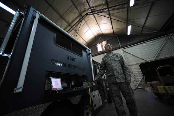 Staff Sgt. Casey Jones, 39th Civil Engineer Squadron emergency management logistics specialist, explains the capabilities of a chemical, biological, radiological and nuclear response vehicle April 25, 2012, at Incirlik Air Base, Turkey. Emergency management is responsible for ensuring base preparedness in the event of a natural disaster, terrorist attack and hazardous material mishap. (U.S. Air Force photo by Senior Airman Jarvie Z. Wallace/Released)