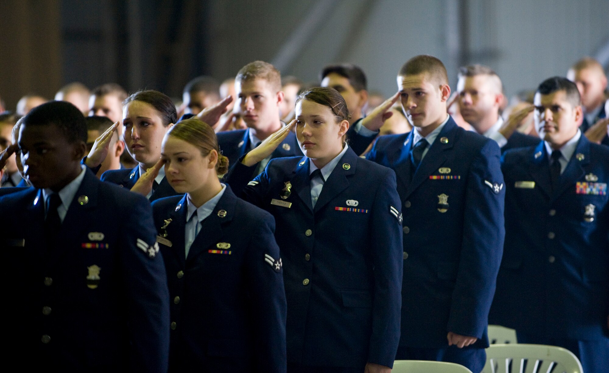 Members of the 39th Security Forces Squadron salute during the memorial service for Airman 1st Class Floyd Glover April 25, 2012, at Incirlik Air Base, Turkey. The ceremony honored the life of Glover, a member of the 39th SFS Avenger Flight who died April 22. (U.S. Air Force photo by Senior Airman Clayton Lenhardt/Released)