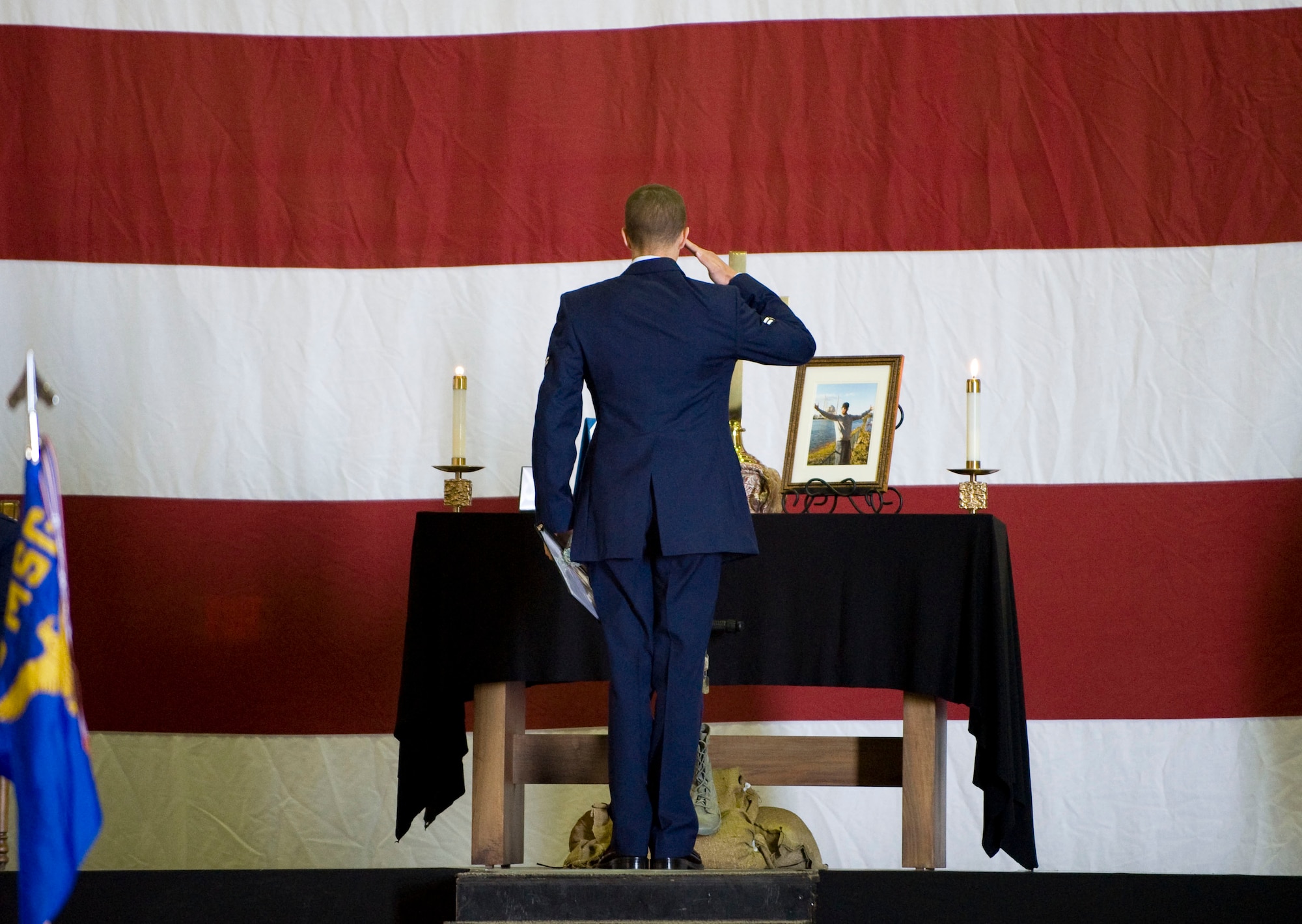 Airman 1st Class Mitchell Gulliver, 39th Security Forces Squadron, renders a final salute during the memorial service for Airman 1st Class Floyd Glover April 25, 2012, at Incirlik Air Base, Turkey. The ceremony honored the life of Glover, a member of the 39th SFS Avenger Flight who died April 22. (U.S. Air Force photo by Senior Airman Clayton Lenhardt/Released)