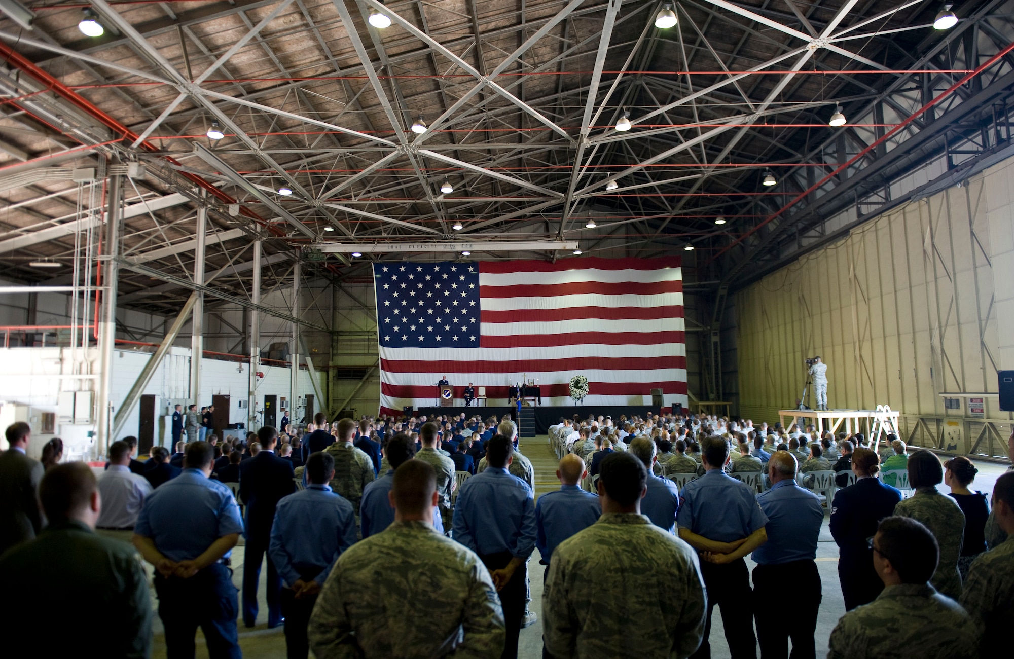 Guests listen during the memorial service for Airman 1st Class Floyd Glover, 39th Security Forces Squadron Avenger Flight, April 25, 2012, at Incirlik Air Base, Turkey. The ceremony honored the life of Glover who died April 22. (U.S. Air Force photo by Senior Airman Clayton Lenhardt/Released)