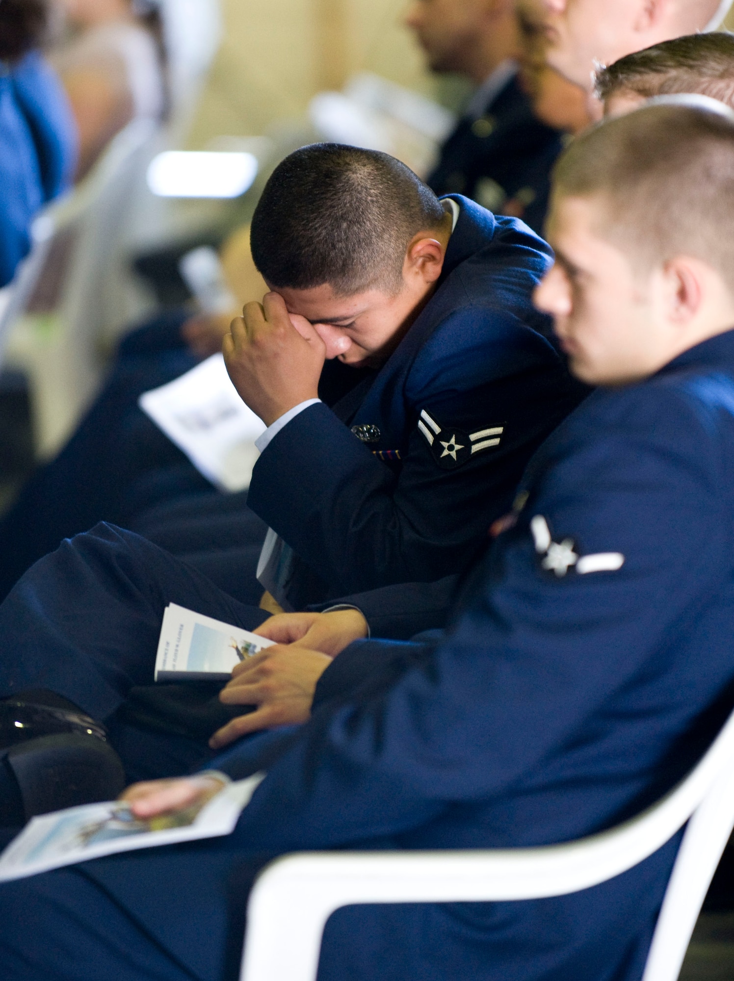 A member of the 39th Security Forces Squadron reacts during the memorial service for Airman 1st Class Floyd Glover April 25, 2012, at Incirlik Air Base, Turkey. The ceremony honored the life of Glover, a member of the 39th SFS Avenger Flight who died April 22. (U.S. Air Force photo by Senior Airman Clayton Lenhardt/Released)