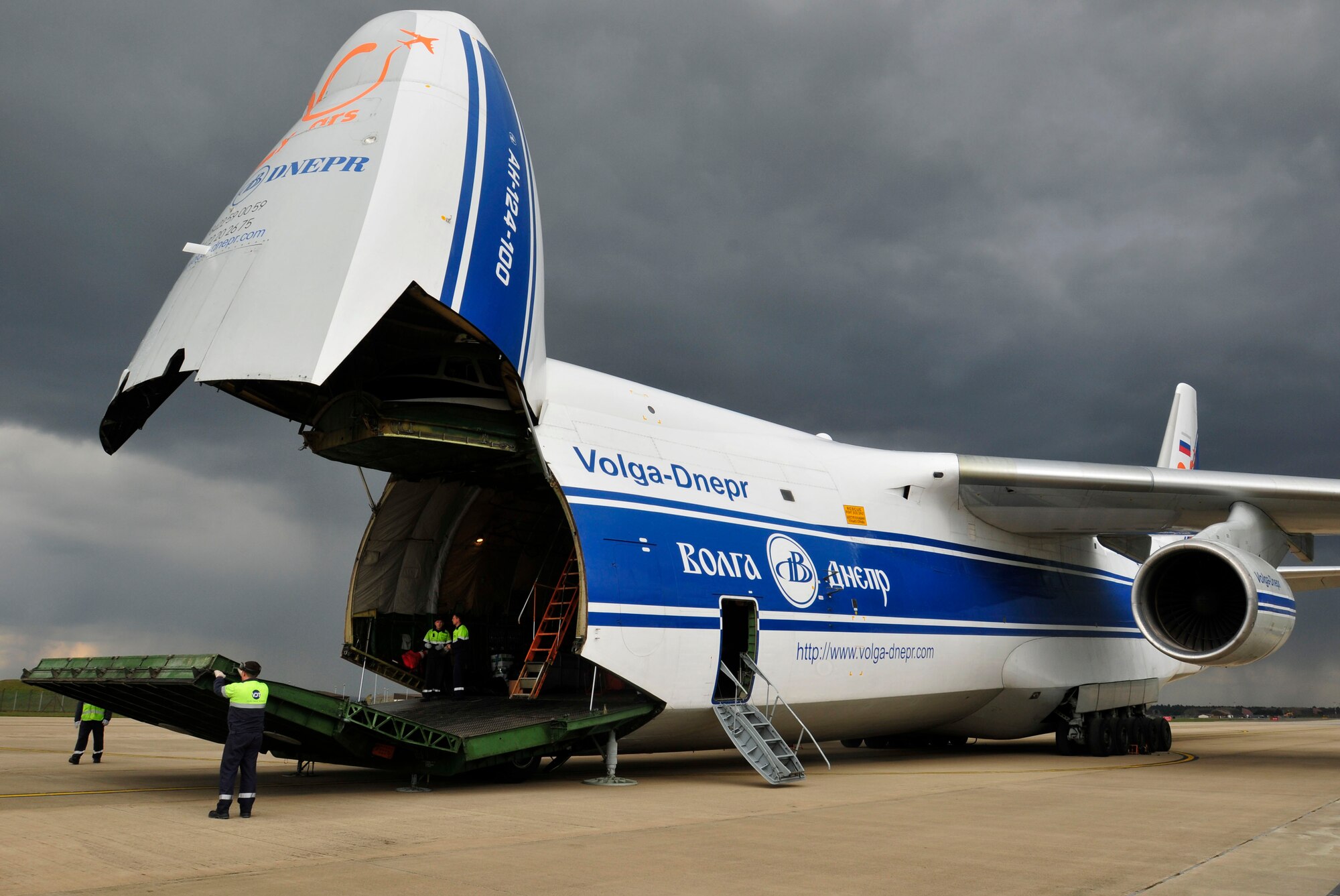 ROYAL AIR FORCE LAKENHEATH, England - Russian civilian aircrew members prepare to unload an HH-60 Pave Hawk from an AN-124 Antonov, a civilian Russian transport carrier, on the flightline April 20, 2012. The helicopter was being returned to RAF Lakenheath after undergoing Joint Depot Level Maintenance at Korean Airlines Limited for eight months. All aircraft undergo this process every 72 months to extend the life of the 56th Rescue Squadron's fleet. (U.S. Air Force photo by Senior Airman Tiffany M. Deuel) 