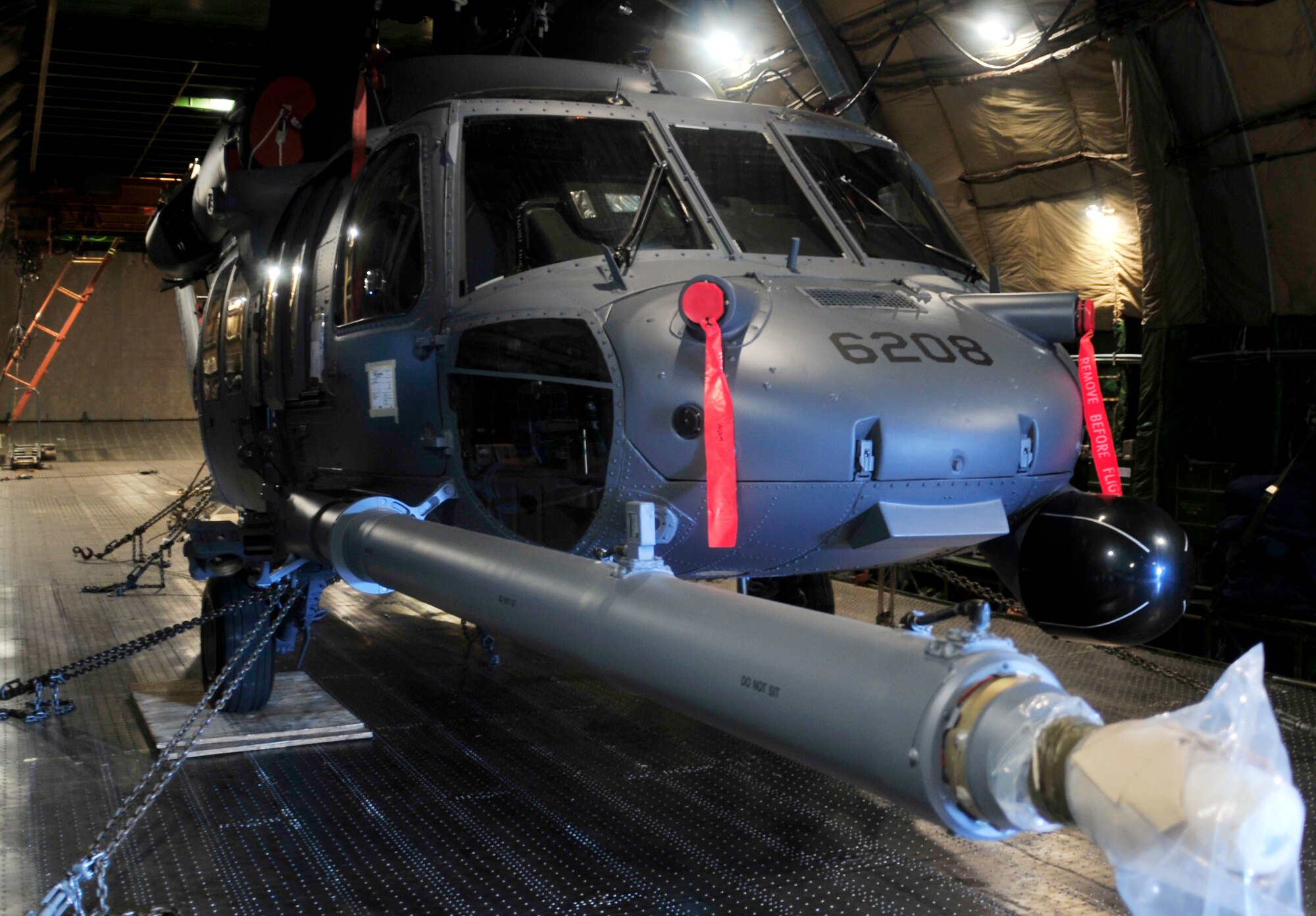 ROYAL AIR FORCE LAKENHEATH, England - An HH-60 Pave Hawk sits inside of an AN-124 Antonov, a civilian Russian transport carrier, April 20, 2012. The helicopter was being returned to RAF Lakenheath after undergoing Joint Depot Level Maintenance at Korean Airlines Limited for eight months. All aircraft undergo this process every 72 months to extend the life of the 56th Rescue Squadron's fleet. (U.S. Air Force photo by Senior Airman Tiffany M. Deuel) 