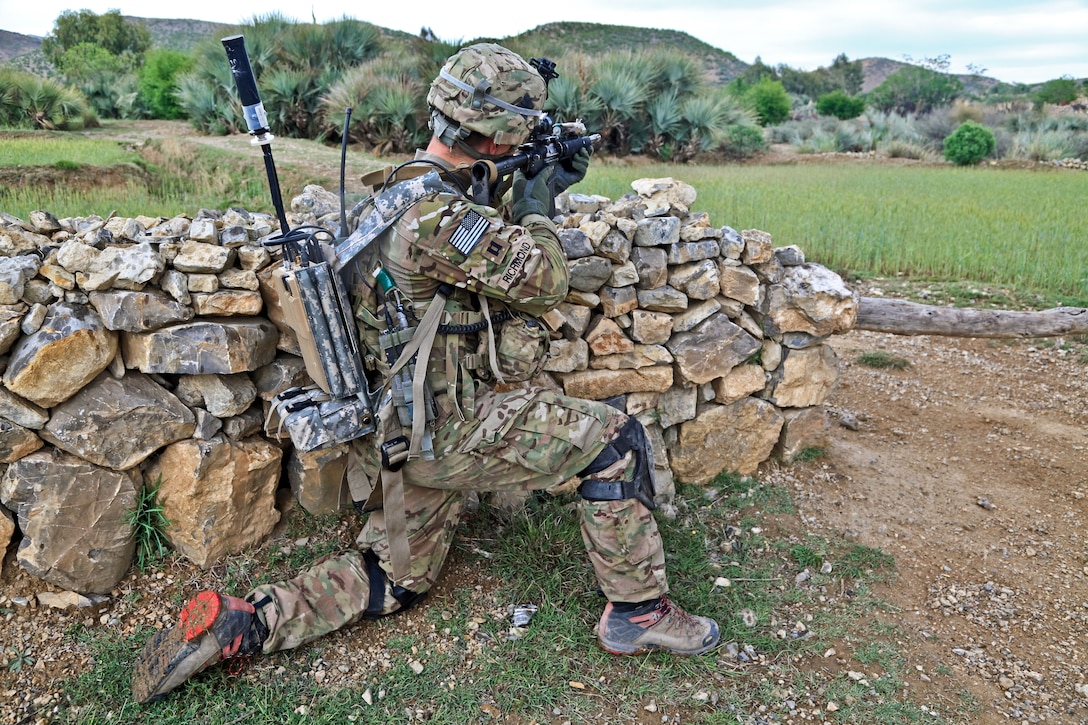 U.S. Army Cpt. Gordon Richmond provides security while on patrol during Task Force Blue Geronimo in Taghawarq village in Afghanistan's Khost province, April 14, 2012. Gordon is assigned to Company B, 1st Battalion, Airborne, 501st Infantry Regiment.