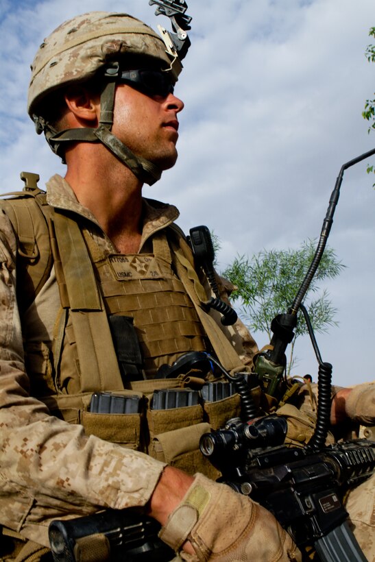 Corporal Ryan Theis, a squad leader with Weapons Company, 2nd Battalion, 6th Marine Regiment, rests during a clearing patrol, April 26, 2012. This is Theis’ second deployment to Afghanistan and his first as a squad leader.