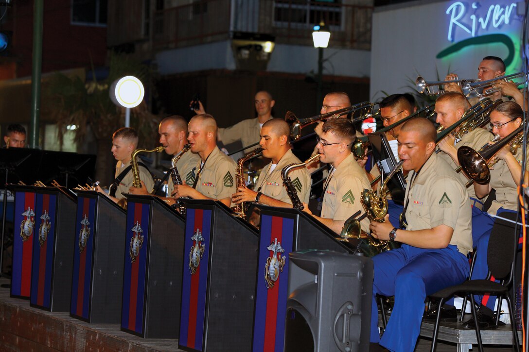 Marines with the III Marine Expeditionary Force Band performs at a free jazz concert in Kin Town April 27. This was the first concert the III MEF Band has held in Kin Town in more than 20 years. The III MEF Band performed this concert to help strengthen community ties through music.