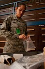 Airman 1st Class Jessie Rhodes, 28th Logistics Readiness Squadron central storage technician, packages small bench stock parts after receiving a new shipment in the storage and issue facility at Ellsworth Air Force Base, S.D., April 25, 2012. Storage and issue is responsible for storing all excess equipment and parts and issuing individual protective equipment. (U.S. Air Force photo by Airman 1st Class Kate Thornton/Released)  