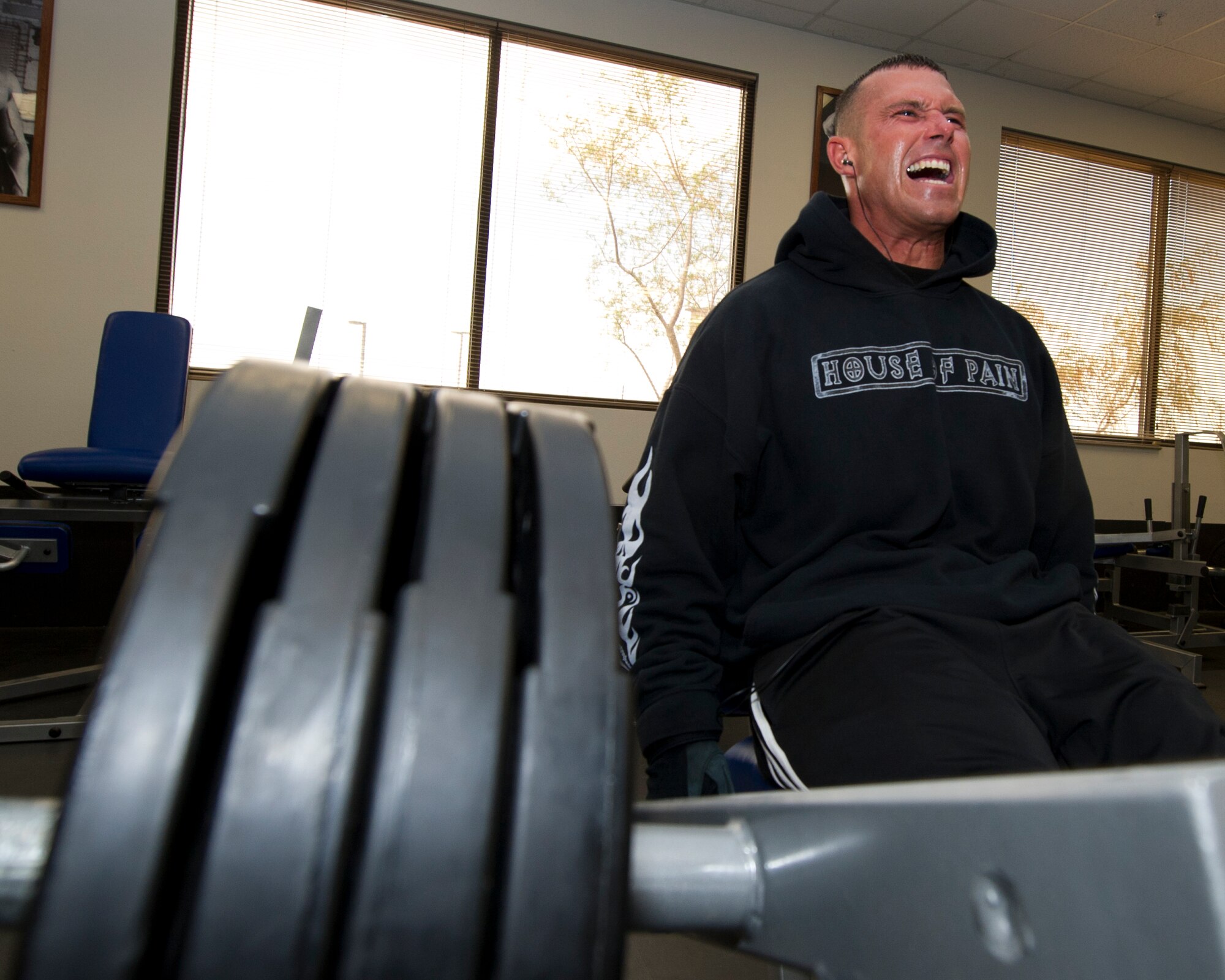 HOLLOMAN AIR FORCE BASE, N.M. – Staff Sgt. Joseph Sapikowski, 49th Security Forces Squadron special reaction team NCO in charge, uses a squat machine at the Domenici Fitness Center April 12. He is one of four Airmen from Holloman AFB competing at Musclemania. Musclemania is a world touring bodybuilding competition which began in 1991. Now in its 20th season, the event has grown to be one of America’s most popular bodybuilding competitions.  (U.S Air Force photo by Airman 1st Class Daniel E. Liddicoet/Released)