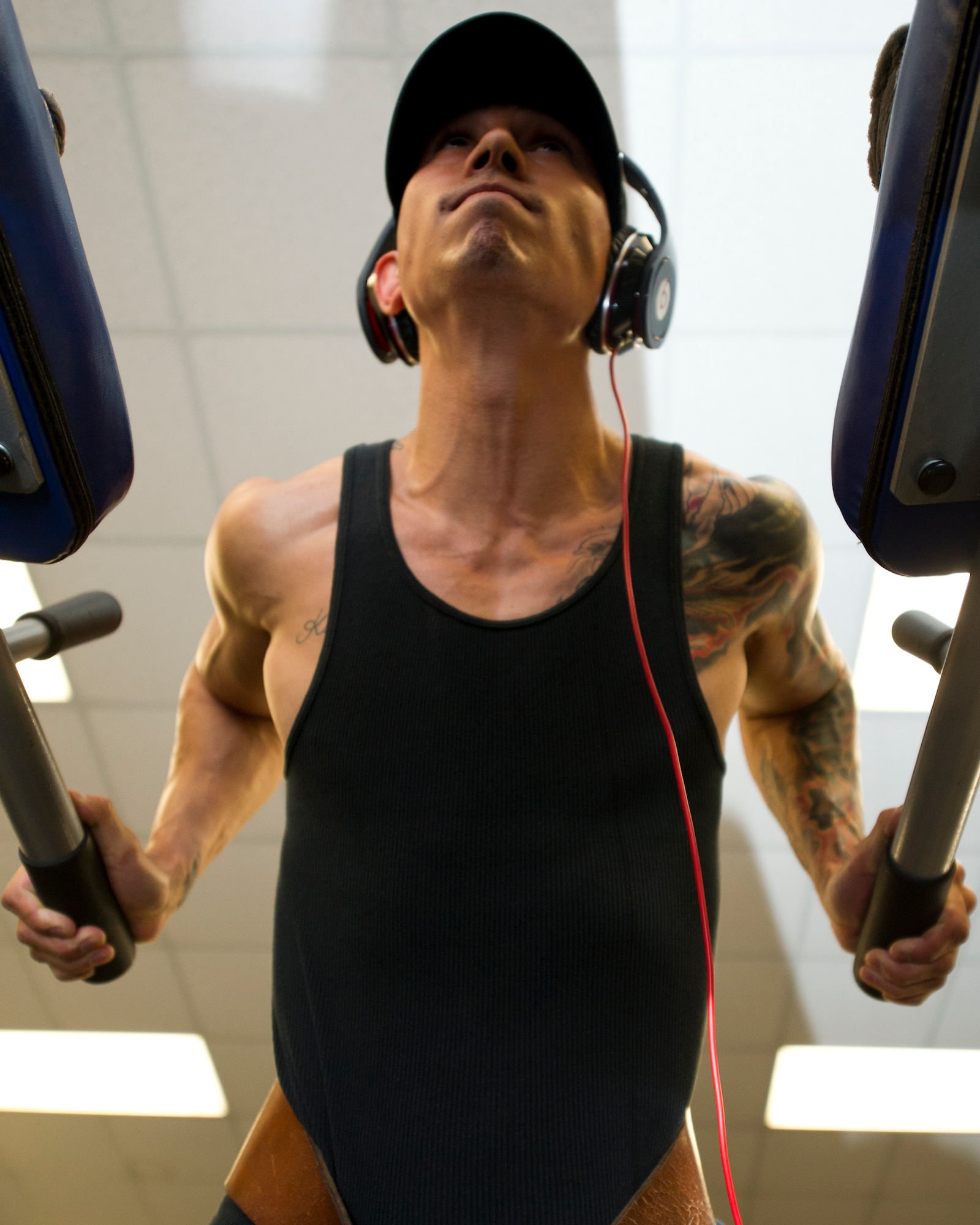 HOLLOMAN AIR FORCE BASE, N.M. – Staff Sgt. Destin Stark, 49th Civil Engineer Squadron water fuels management craftsman, performs dips at the Domenici Fitness Center April 12. He is one of four Airmen from Holloman AFB competing at Musclemania.  Musclemania is a world touring bodybuilding competition which began in 1991. Now in its 20th season, the event has grown to be one of America’s most popular bodybuilding competitions.  (U.S Air Force photo by Airman 1st Class Daniel E. Liddicoet/Released)
