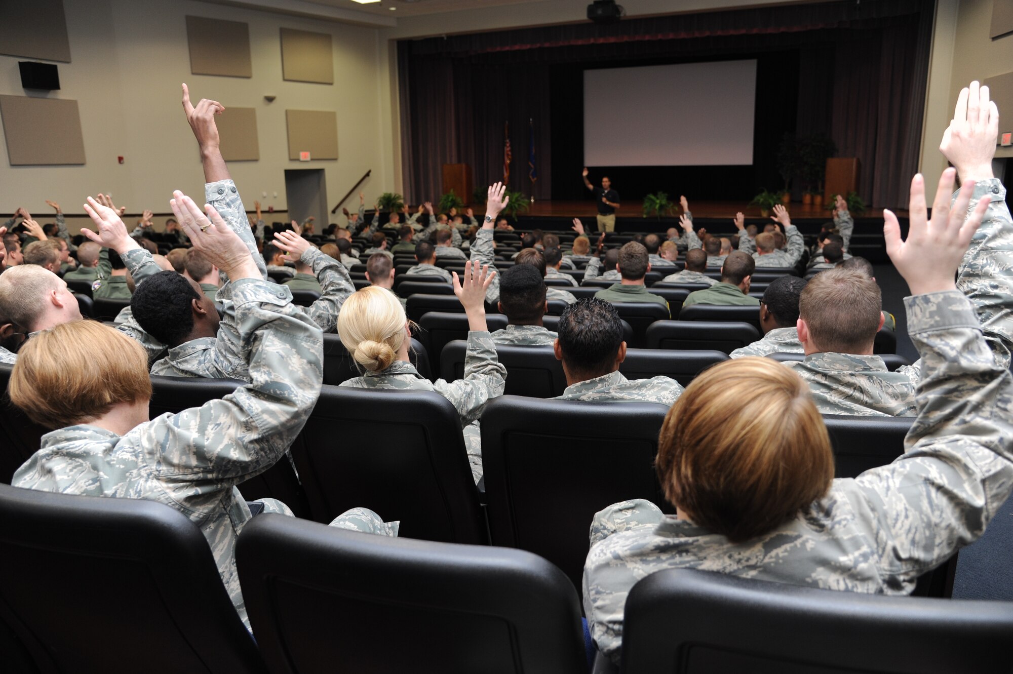 Team BLAZE members make their vote on a sexual assault case based on a real event during the second showing of a SARC show by Brett Sokolow, a higher education attorney who specializes in sexual misconduct and campus security in the Kaye Auditorium on April 24. The presentation armed Airmen with tips on how to figure out if a partner can give their consent. (U.S. Air Force photo/Senior Airman Chase Hedrick)