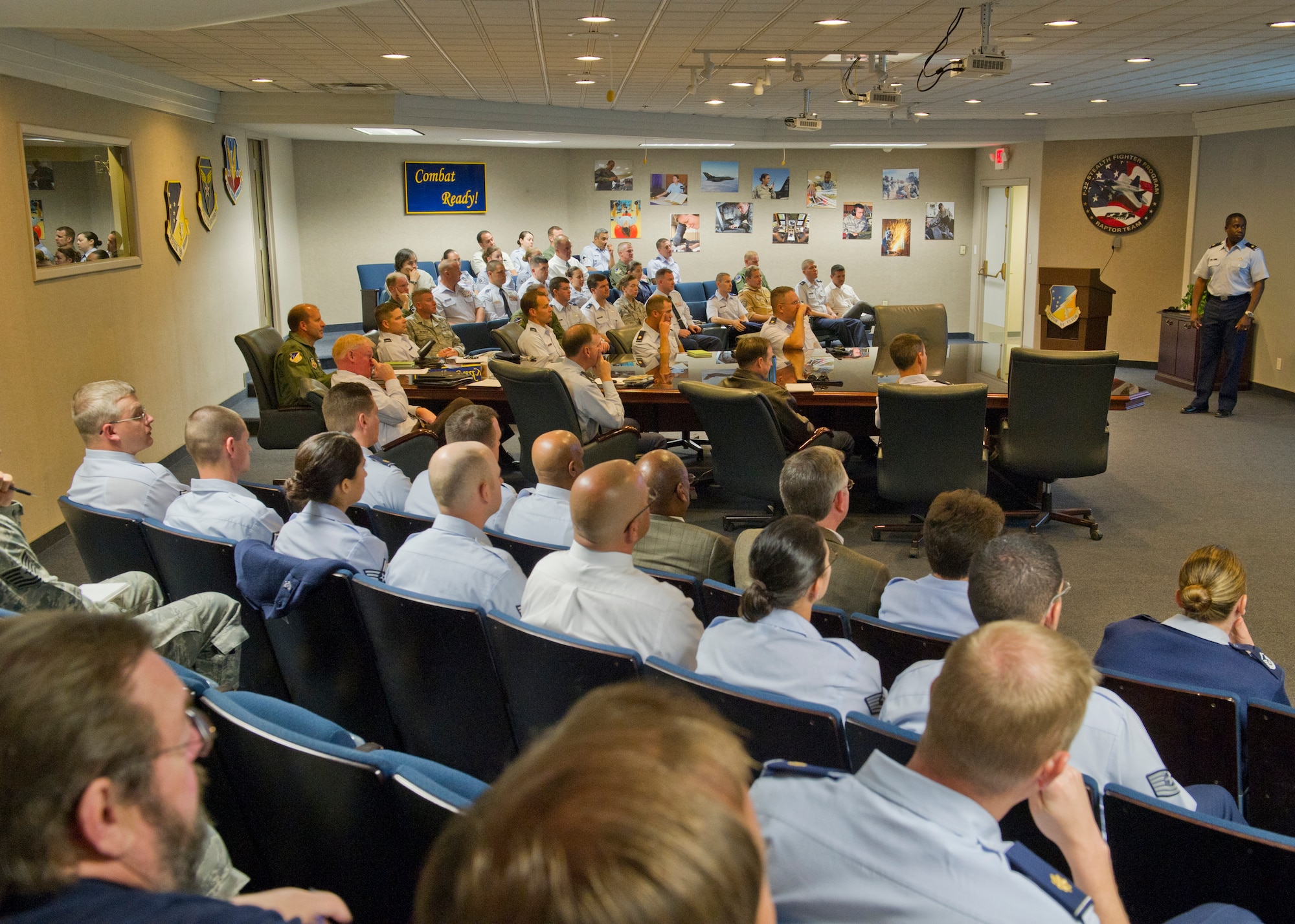 HOLLOMAN AIR FORCE BASE, N.M. – Maj. D. Scott Harris, Airfield Operations Compliance Inspection team chief, briefs members of Team Holloman about the AOCI April 23. The AOCI is done to ensure the airfield environment is safe of any hazards and to make sure Holloman AFB is providing a safe flying environment to all local and transient aircraft. Harris and his team, which is made up of members from Air Combat Command and the Air Force Flight Standards Agency, were on base from April 20-27 for the inspection. (U.S. Air Force photo by Airman 1st Class Siuta B. Ika/ Released)