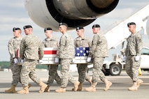 A U.S. Army carry team transfers the remains of Army Spc. Manuel J. Vasquez, of West Sacramento, Calif., at Dover Air Force Base, Del., April 27, 2012. Vasquez was assigned to the 2nd Battalion, 28th Infantry Regiment, 172nd Infantry Brigade, Grafenwoehr, Germany. (U.S. Air Force photo/Roland Balik)