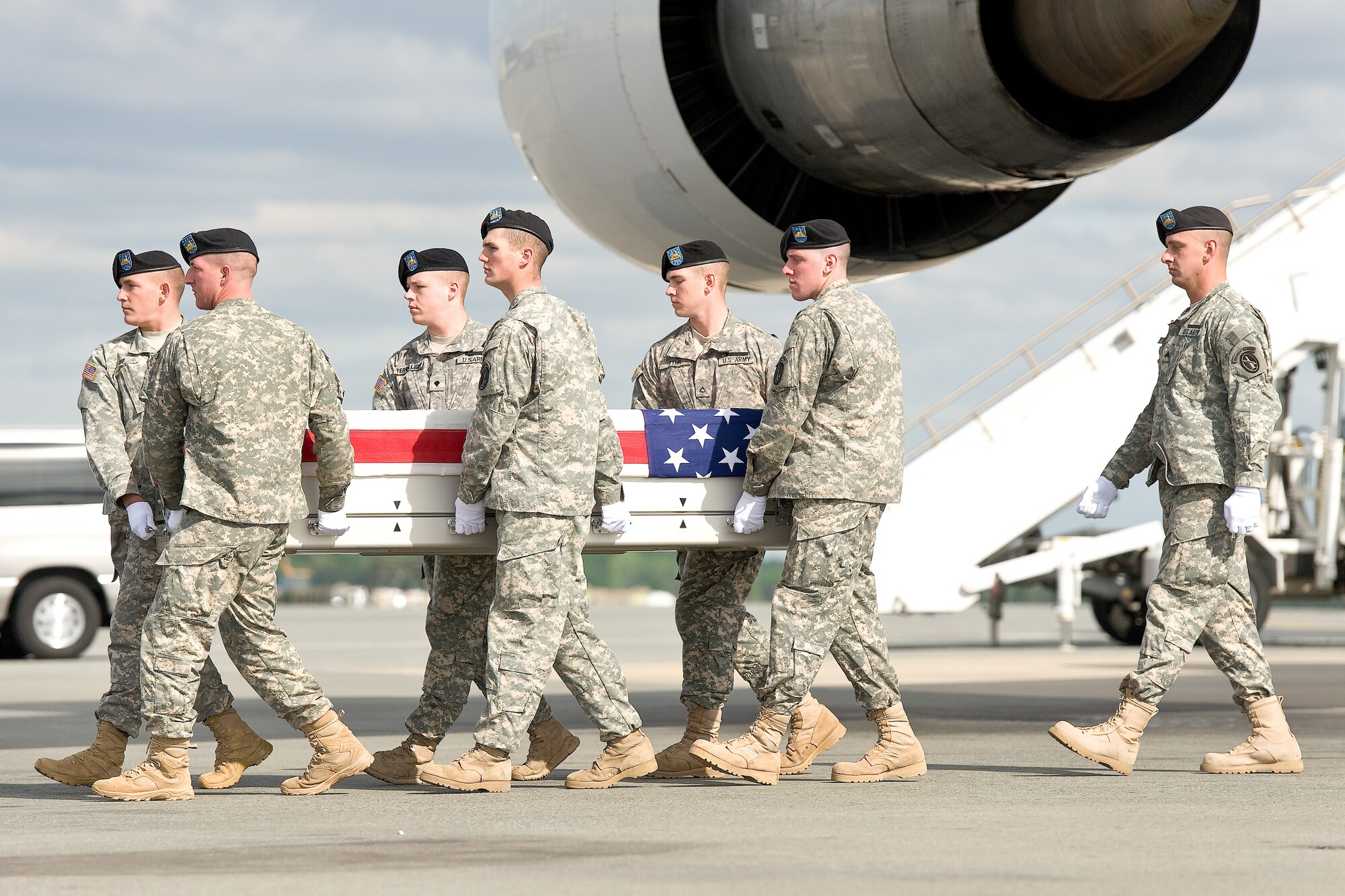 A U.S. Army carry team transfers the remains of Army Spc. Moises J. Gonzalez, of Huntington Park, Calif., at Dover Air Force Base, Del., April 27, 2012. Gonzalez was assigned to the 509th Combat Service Support Company, Fort Hood, Texas. (U.S. Air Force photo/Roland Balik)