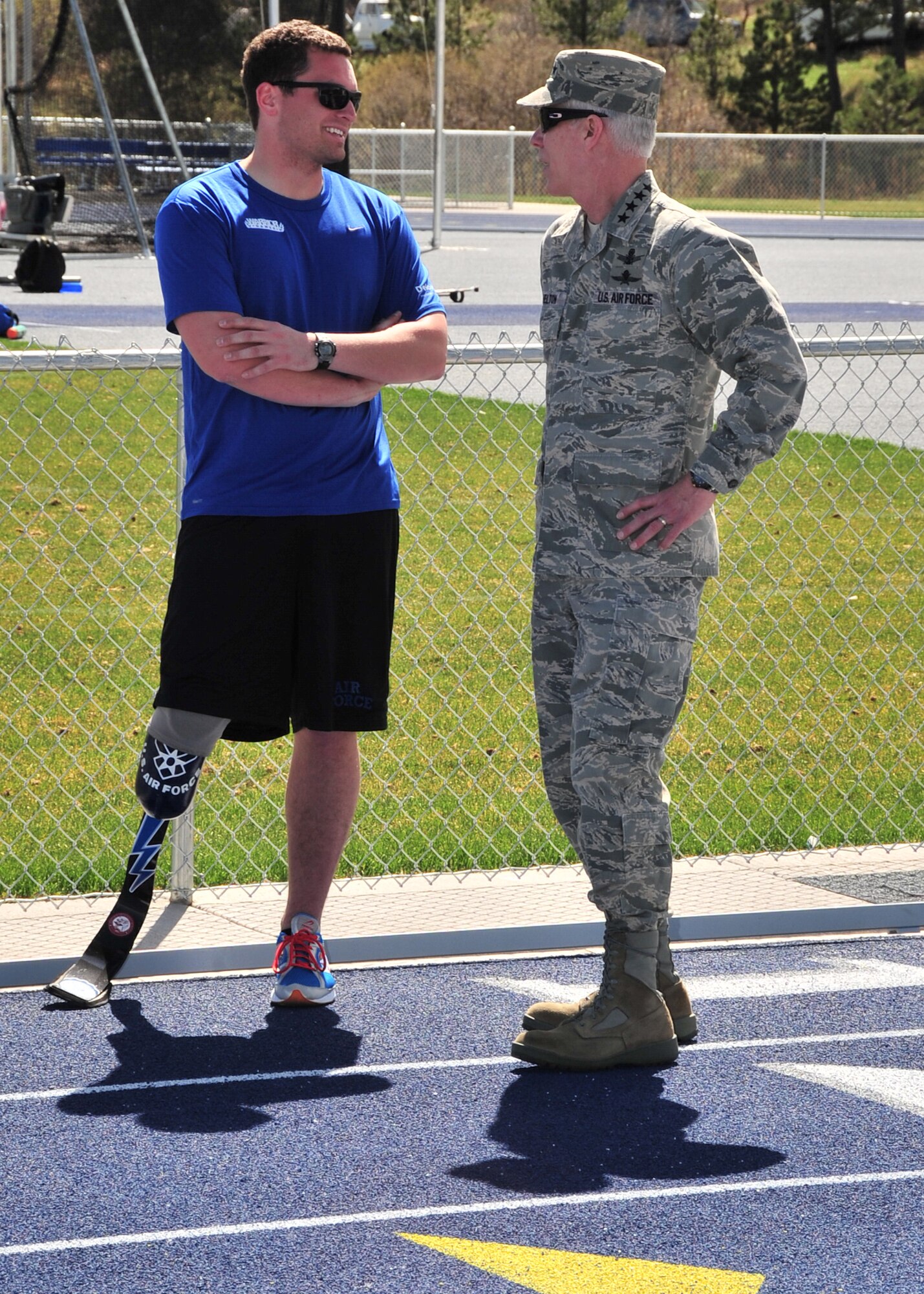 Gen. William L. Shelton, Commander, Air Force Space Command, talks with Warrior Games competitor 1st Lt. Ryan McGuire who is a C-17 pilot assigned to the 4th Airlift Squadron, Joint Base Lewis-McChord, Wash. The Air Force encourages wounded warriors to reach for and achieve a rich and productive future, to defeat their illness or injury to maximize their abilities and know that they can have a rich and fulfilling life beyond what has happened to them in service to their nation. (U.S. Air Force photo/Duncan Wood)