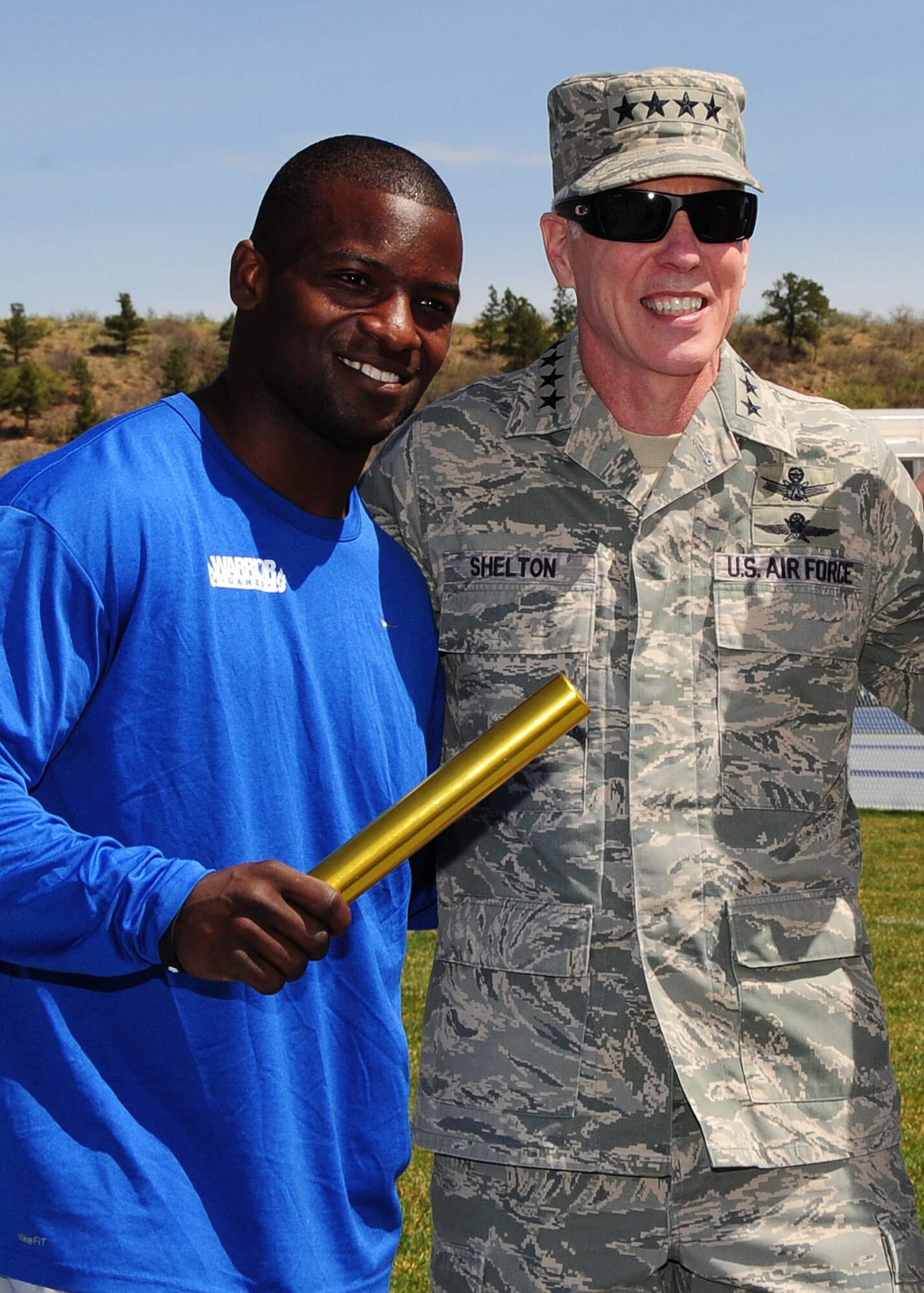 Gen. William L. Shelton, Commander, Air Force Space Command, spends time with Warrior Game competitor retired Staff Sgt. Elmer Sanders at the U.S. Air Force Academy, Colo. April 25. Warrior Games serves as an introduction to Paralympic sport, while at the same time builds camaraderie and raises awareness of adaptive sports. (U.S. Air Force photo/Duncan Wood)