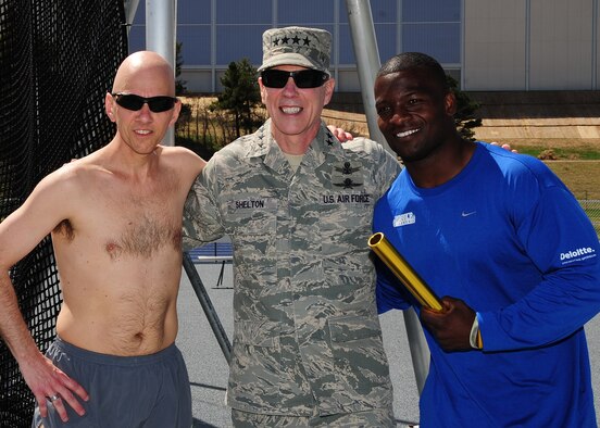 Gen. William L. Shelton, Commander, Air Force Space Command, spends time with Warrior Game competitors Senior Master Sgt. Mike Sanders and retired Staff Sgt. Elmer Sanders at the U.S. Air Force Academy, Colo. April 25. The Air Force encourages wounded warriors to reach for and achieve a rich and productive future, to defeat their illness or injury to maximize their abilities and know that they can have a rich and fulfilling life beyond what has happened to them in service to their nation. (U.S. Air Force photo/Duncan Wood)