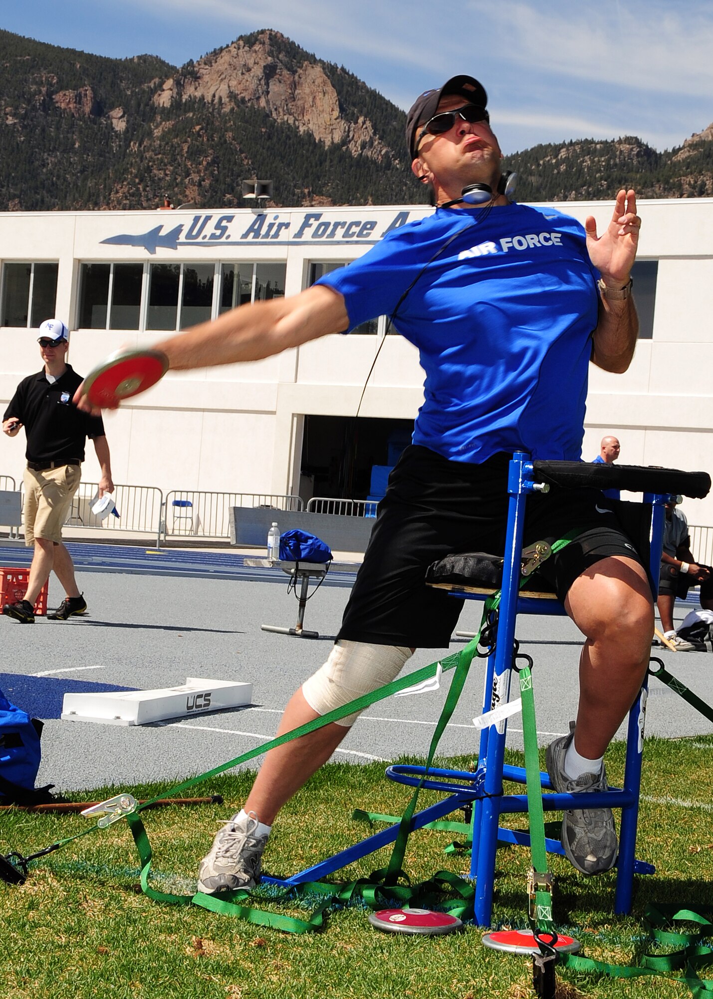 Retired Chief Master Sgt. Damian Orslene throws a discus during the Warrior Games at the U.S. Air Force Academy, Colo.  April 25. The Air Force encourages wounded warriors to reach for and achieve a rich and productive future, to defeat their illness or injury to maximize their abilities and know that they can have a rich and fulfilling life beyond what has happened to them in service to their nation. (U.S. Air Force photo/Duncan Wood)