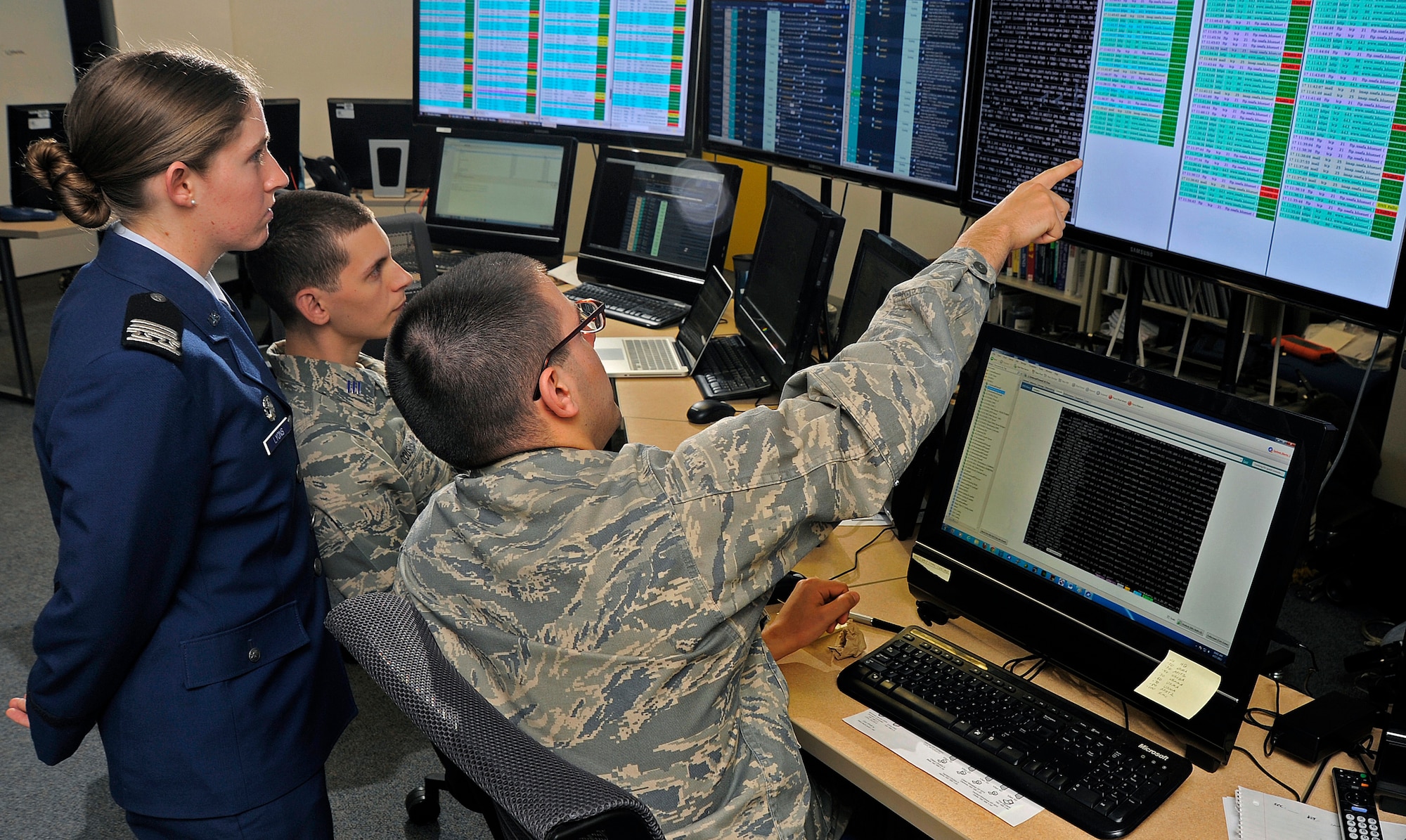 Left to right: Cadets 1st Class Kate Lyons of Cadet Squadron 21, Mike Cousins of CS 01 and Geoff Pamerleau of CS 20 participate in the National Security Agency's Cyber Defense Exercise April 17, 2012. The cadets took first place in the competition, beating their counterparts at the other U.S. service academies and two post-graduate teams from the Air Force Institute of Technology. (U.S. Air Force photo/Raymond McCoy)