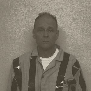 Viktor Frankl, portrayed by U.S. Air Force Lt. Col. Kenneth Dewlen, 366th Force Support Squadron commander, stands against a wall as if in a concentration camp, April 26, 2012, at Mountain Home Air Force Base, Idaho. Dewlen read a speech written by Viktor Frankl as a part of Days of Remembrance, which is held in honor of those who died or were librated from Nazi controlled concentration camps. (U.S. Air Force photo illustration/Airman 1st Class Jonathan Glanville)