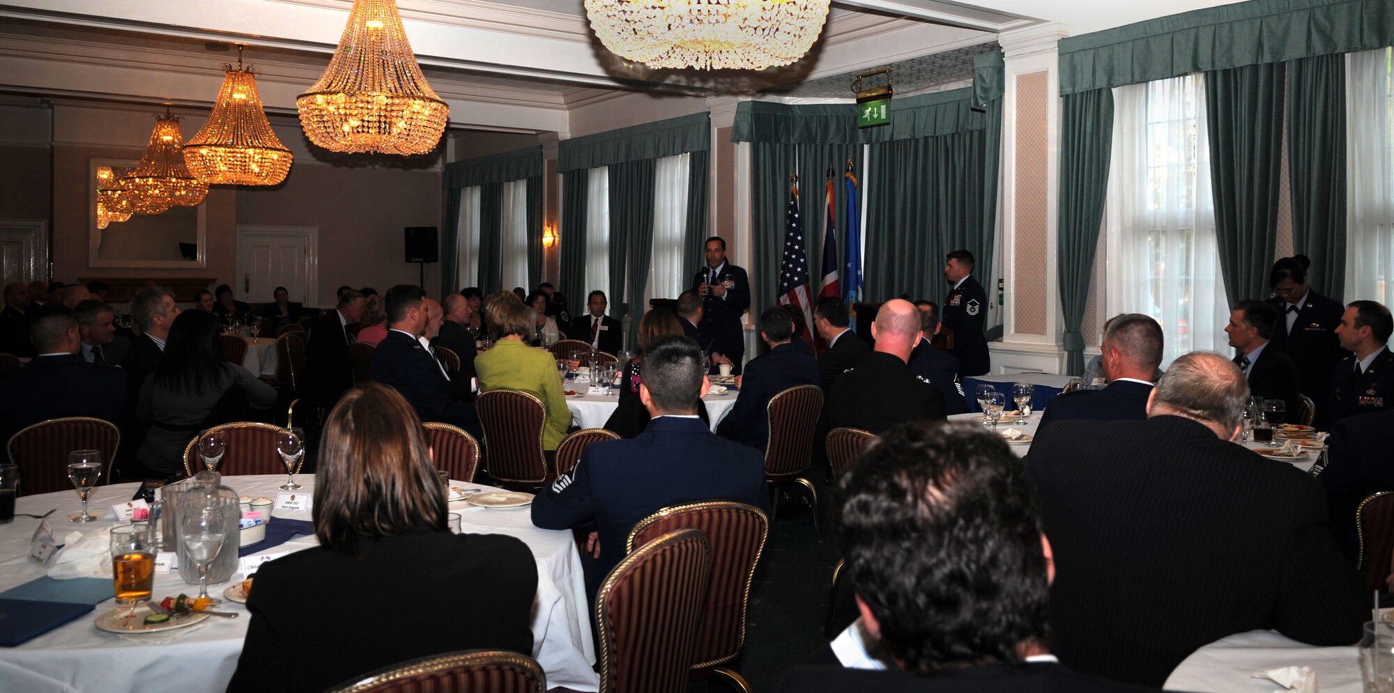 RAF MILDENHALL, England -- Col. Christopher Kulas, 100th Air Refueling Wing commander, addresses members of Team Mildenhall and newly-inducted Honorary Commanders during the Honorary Commanders’ Induction Ceremony at Middleton Hall April 26, 2012. The Honorary Commander program is designed to help build and strengthen relationships between the military and local British communities. (U.S. Air Force photo/Senior Airman Rachel Waller) 