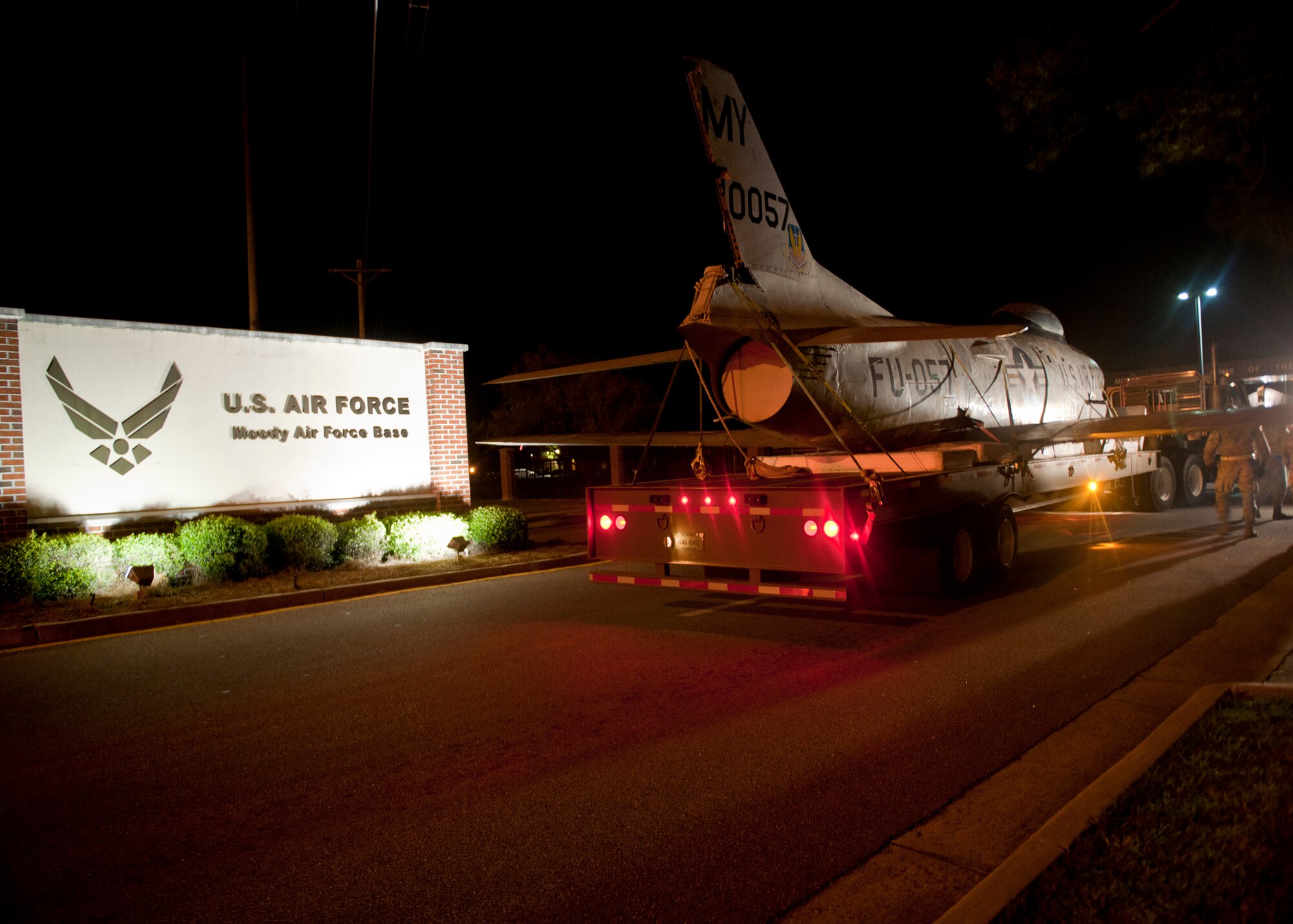 An F-86L Sabre arrives at Moody Air Force Base, Ga., after being transported from downtown Valdosta, Ga., April 25, 2012. Several city and base agencies assisted in the relocation, to include: Moody civil engineer squadron, security forces squadron, crash recovery, Lowndes County and Valdosta Sheriff’s Department, and Valdosta utility departments. Varying equipment was used to safely and securely transport the aircraft. (U.S. Air Force photo by Senior Airman Eileen Meier/Released)