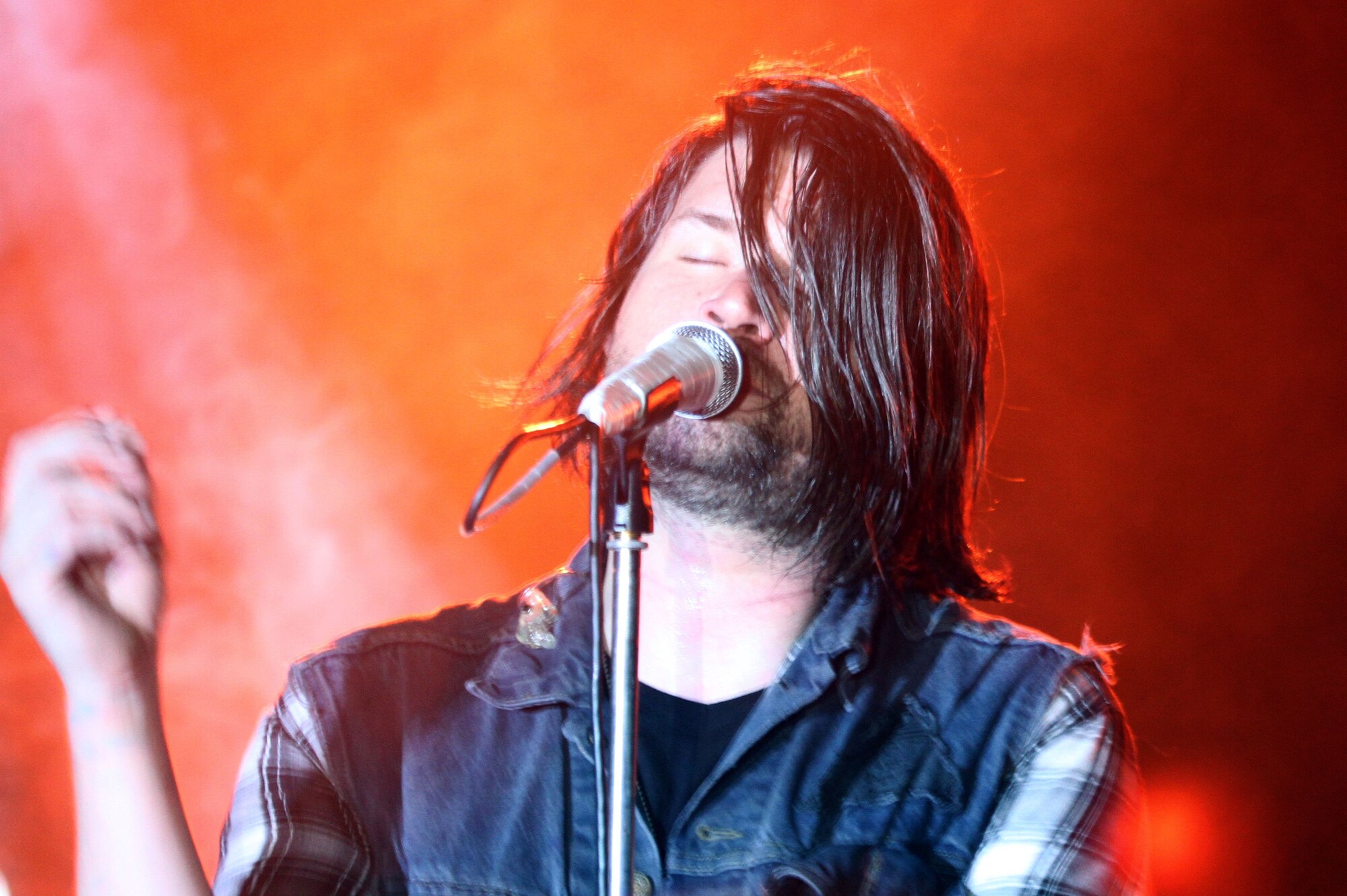 SPANGDAHLEM AIR BASE, Germany – Adam Lazzara, lead vocalist for Taking Back Sunday, a rock band from Rockville, N.Y., performs at the Skelton Memorial Fitness Center here April 26. The band played a variety of songs from their albums. The event was sponsored by Navy Entertainment in partnership with Armed Forces Entertainment. Taking back Sunday is touring Germany and the United Kingdom April 24 through May 2. (Courtesy photo/Released)