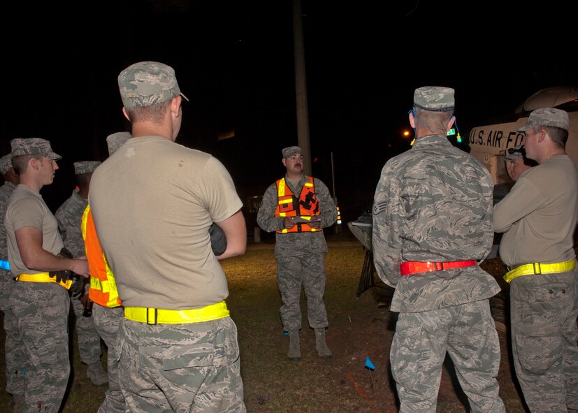 U.S. Air Force Tech. Sgt. Thomas Breining, 23d Equipment Maintenance Squadron, briefs Airmen on the task of relocating the F-86L Sabre that resided as a landmark for several years in Valdosta, Ga., April 24, 2012. The aircraft was moved late in the  evening and early morning hours to mitigate any traffic issues that might occur in the daytime. (U.S. Air Force photo by Senior Airman Eileen Meier/Released)