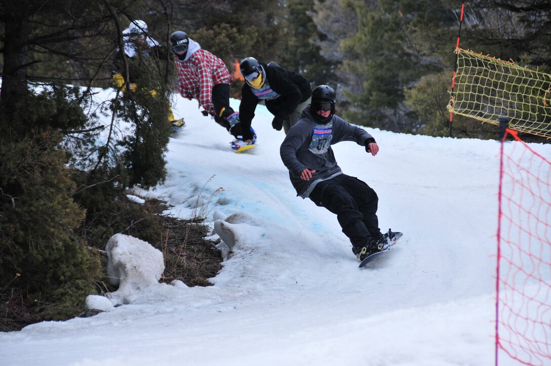 Snowboarders compete during the Park Riders Roundup held at Great Divide Ski Area March 24, 2012. (U.S. Air Force photo by Senior Master Sgt. Eric Peterson)