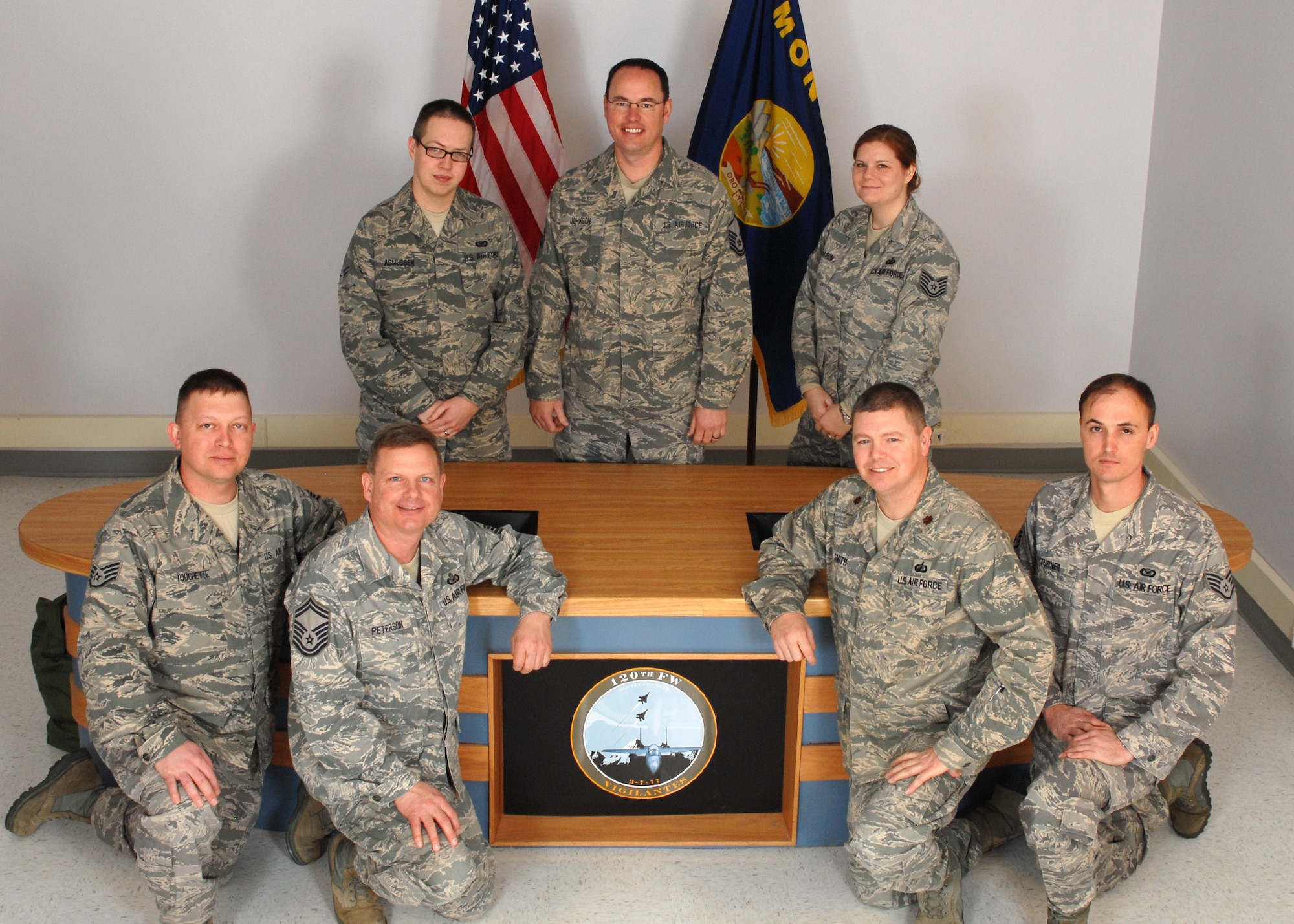 The 120th Public Affairs team consists of (TOP LEFT-CLOCKWISE) Airman 1st Class Nik Asmussen, Master Sgt. Jason Johnson, Tech. Sgt. Christy Mason, Staff Sgt. John Turner, Maj. Cody Smith, Senior Master Sgt. Eric Peterson and Staff Sgt. Mike Touchette. (U.S. Air Force photo 
by Tech. Sgt. Sean Keighley)