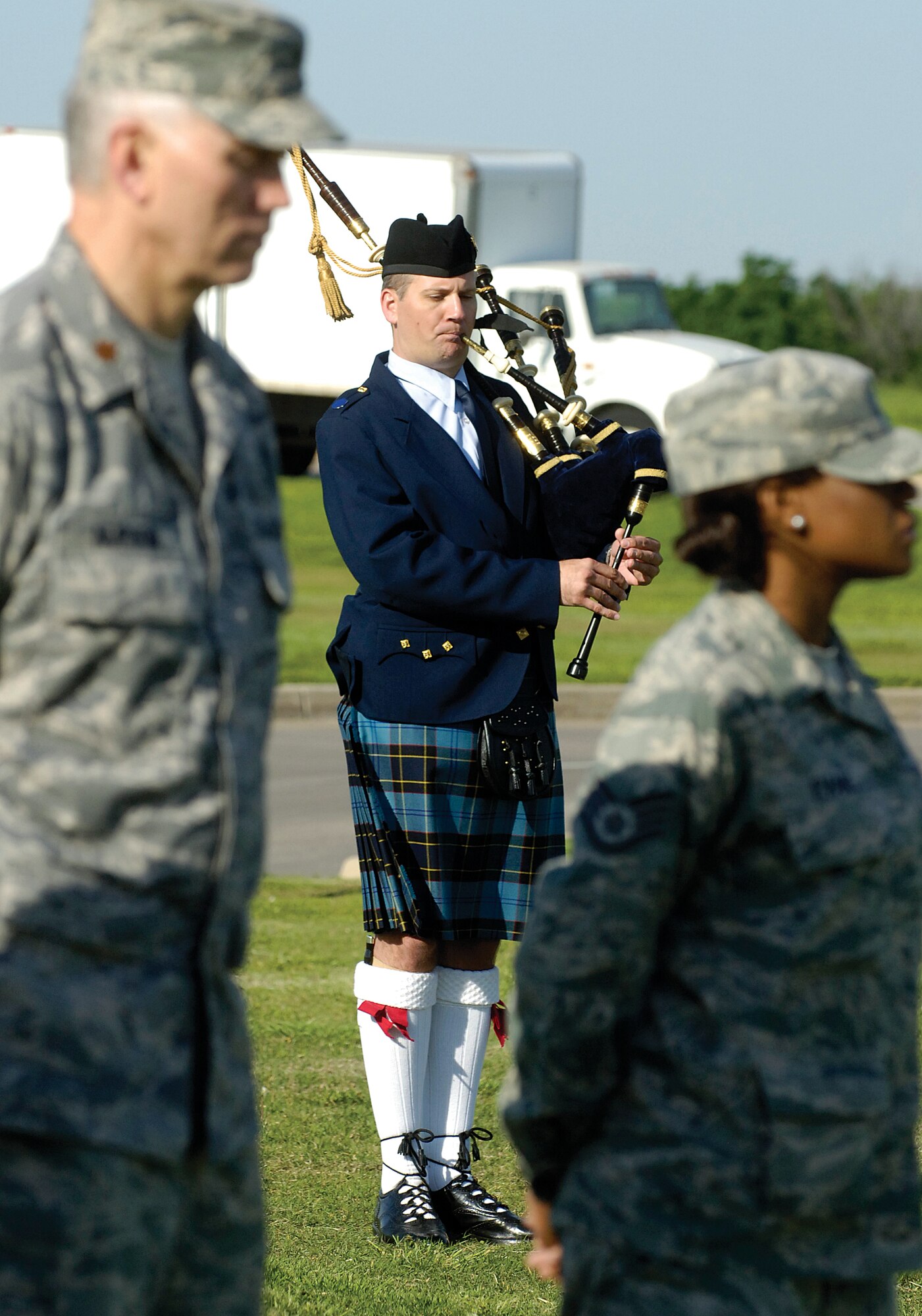 Staff Sgt. Benny Hill, a piper with the Band of the Air Force Reserve pipe band, plays Amazing Grace during  Tinker’s April 19 memorial tribute to victims of the 1995 Oklahoma City Alfred P. Murrah federal building bombing. The ceremony also included the playing of Taps by the Tinker Honor Guard and concluded with a ceremonial flight lowering the Wright Flyer American flag to half-staff. Sergeant Hill is a B-2 system verification manager in the 412th Logistics Test Squadron. (Air Force photo by Margo Wright)