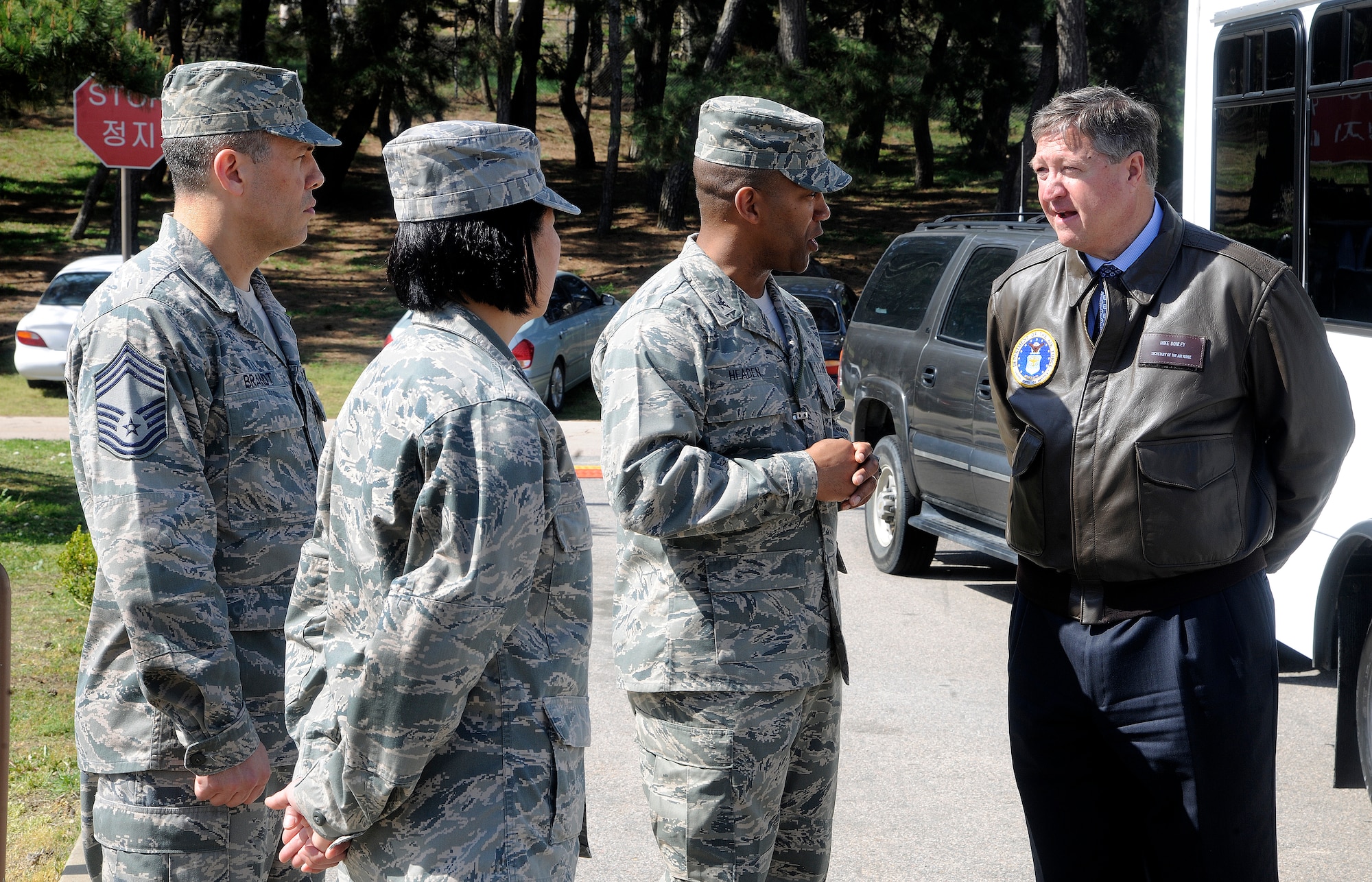 Secretary of the Air Force Michael Donley talks to Col. Alvis C. Headen, 8th Medical Group commander, during a visit to the 8th Medical Group at Kunsan Air Base, Republic of Korea, April 27, 2012. The secretary toured various facilities around Kunsan during his visit to the base. (U.S. Air Force photo/Staff Sgt. Rasheen A. Douglas)
