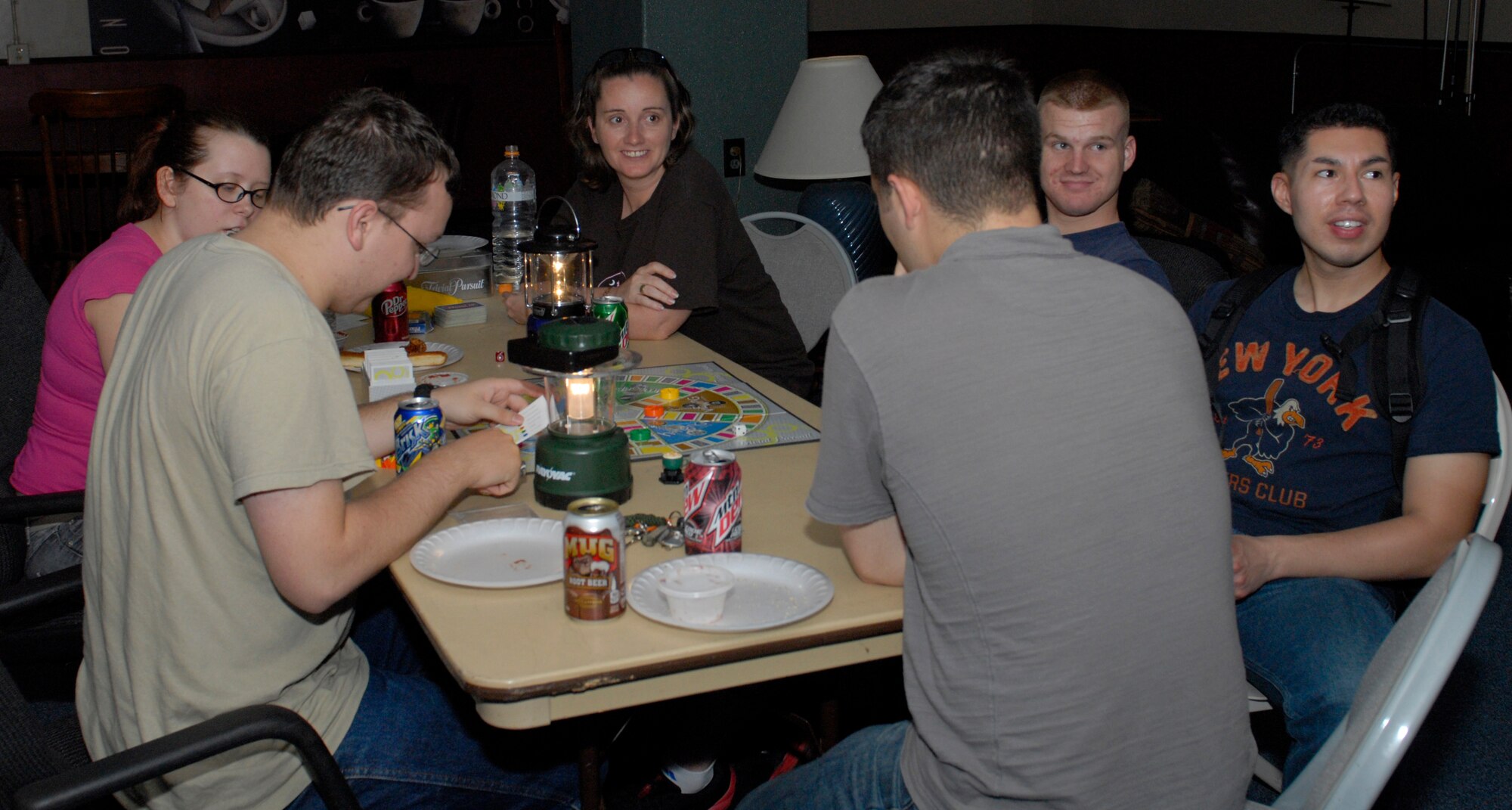 Members of the Wired Bean community play a board game at the Wired Bean on Kadena Air Base, Japan, April 25, 2012. Members of the community come together each Wednesday to participate in a multitude of activities and events. (U.S. Air Force photo/Airman 1st Class Malia Jenkins)
