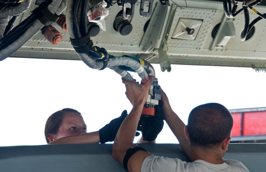 ANDERSEN AIR FORCE BASE, Guam –Airmen from the 36th Expeditionary Aircraft Maintenance Squadron,  upload a training Conventional Air-Launched Cruise Missile during the Combat Ammunition Production Exercise, Andersen Air Force Base, Guam, April 23, 2012. During the CAPEX approximately 21 inspectors will evaluate the processes and procedures for building munitions to support the wing’s operational plan. (U.S. Air Force photo by Staff Sgt. Alexandre Montes)