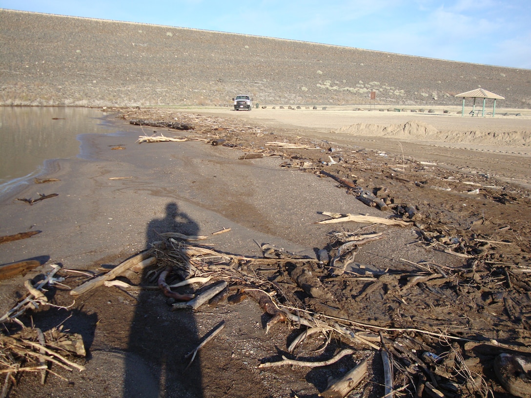 This photo of debris accumulating on the beach at Cochiti Lake was taken April 10, 2012, and shows the volume and type of material flowing into the lake since last year’s wild fires.
