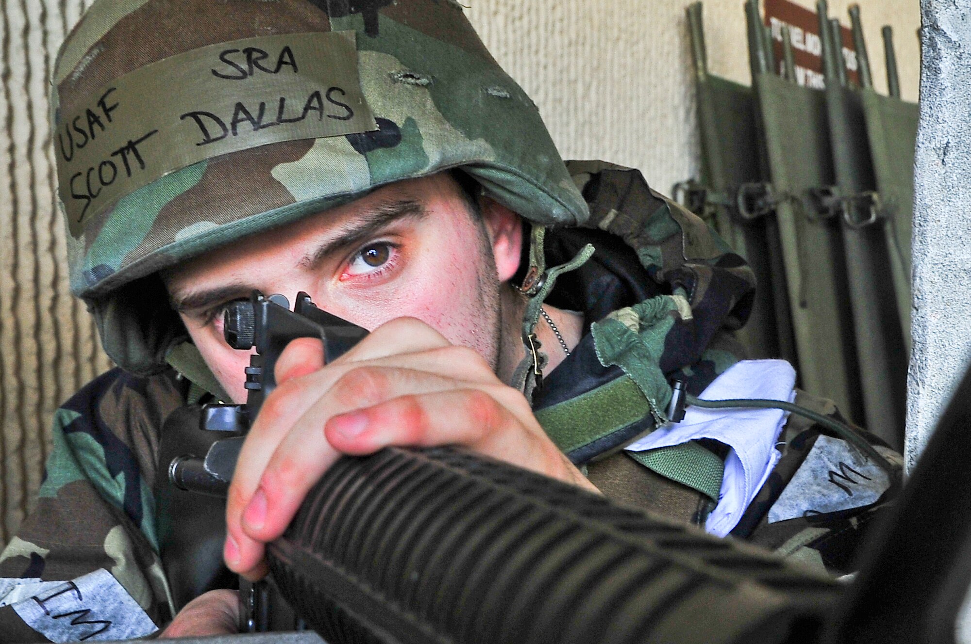 Senior Airman Scott Dallas, 51st Dental Squadron lab technician, checks his sector of fire from a defensive fighting position after a rise in security during the operational readiness exercise portion of the Consolidated Unit Inspection at Osan Air Base, Republic of Korea, April 24, 2012. This CUI is Osan’s first, and the PACAF inspectors looked at operational readiness and unit compliance. (U.S. Air Force photo/Senior Airman Adam Grant)