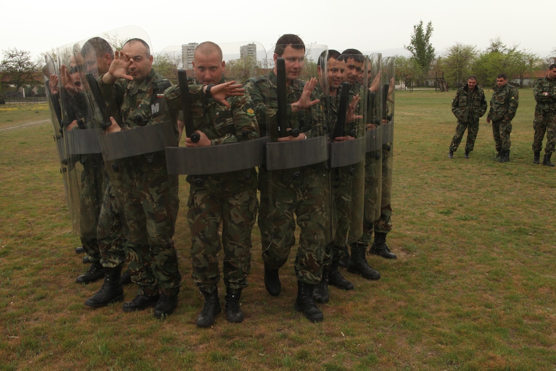 Bulgarian soldiers practice riot shield techniques taught to them by Marines from the Military Police Detachment, Black Sea Rotational Force 12, in Plovdiv, Bulgaria, April 16. The training was part of a three-day non-lethal weapons display which included kinetic as well as static displays of weapons, equipment and tactics. ::r::::n::
