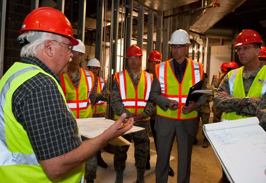 Ellsworth Air Force Base leadership tours the Bandit Inn dining facility during its upgrade construction on Ellsworth AFB, S.D., April 25, 2012. The upgrades will enhance the quality of service to Airmen by providing increased seating capacity, an outdoor patio with access to grills and increased hours of operation. The upgrades are expected to be complete October of this year. (U.S. Air Force photo by Airman 1st Class Kate Thornton/Released)