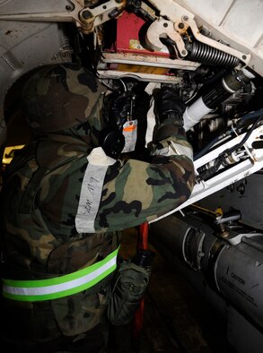 U.S. Air Force Senior Airman Christopher Barnes, 35th Maintenance Squadron Fuel System journeyman, performs duties in full mission oriented protective posture gear during an operational readiness exercise at Misawa Air Base, Japan, May 01, 2012. The purpose of conducting OREs is to maintain readiness and stay prepared to perform duties in a deployed environment. (U.S. Air Force photo by Airman 1st Class Kaleb Snay/Released)