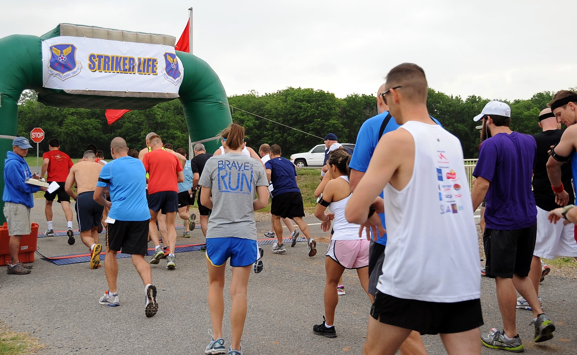 Team Barksdale members set their watches at the start of the Air Force Global Strike Command Striker Life Half Marathon on Barksdale Air Force Base, La., April 28. More than 150 Team Barksdale members participated in the command's first-ever event. (U.S. Air Force photo/Staff Sgt. Amber Ashcraft)(RELEASED)