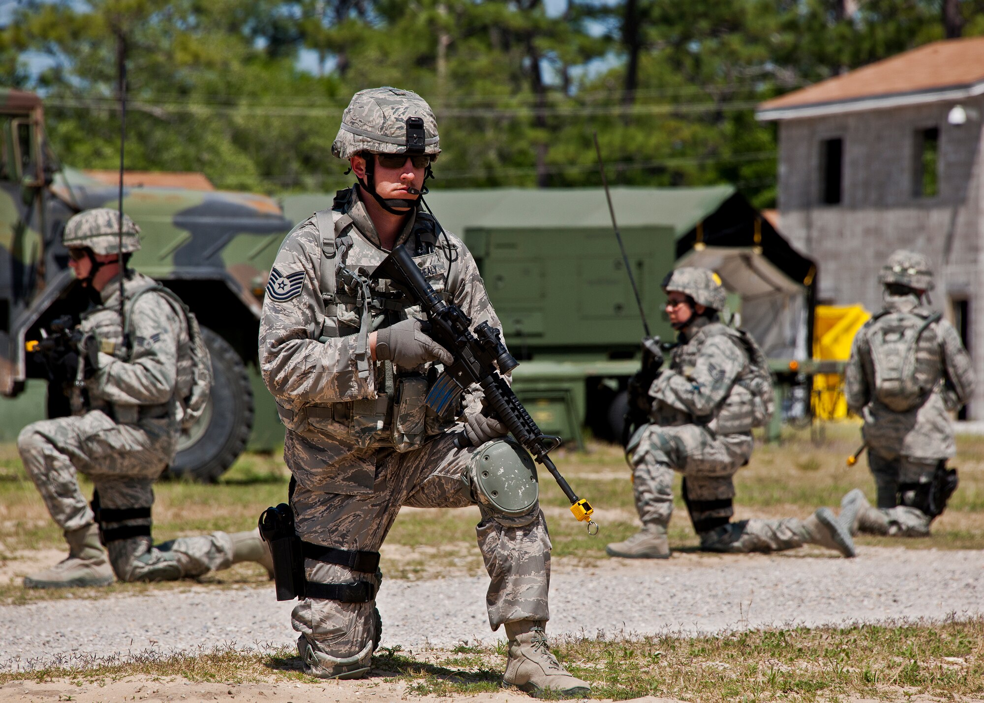 Tech. Sgt. Jarrod Healy, a guardsman from the 114th Security Forces Squadron, was part of the first counter-insurgency operation of the three-day Brave Defender field training exercise April 26 at Eglin Air Force Base, Fla.  The exercise is the culmination of Air Force Materiel Command’s six-week security forces deployment training, administered by the 96th Ground Combat Training Squadron. GCTS instructors teach 10 training classes a year, which consists of improvised explosive device detection and reaction, operating in an urban environment, mission planning, land navigation casualty care and more. More than 100 active-duty and National Guard Airmen attended this training. (U.S. Air Force photo/Samuel King Jr.)