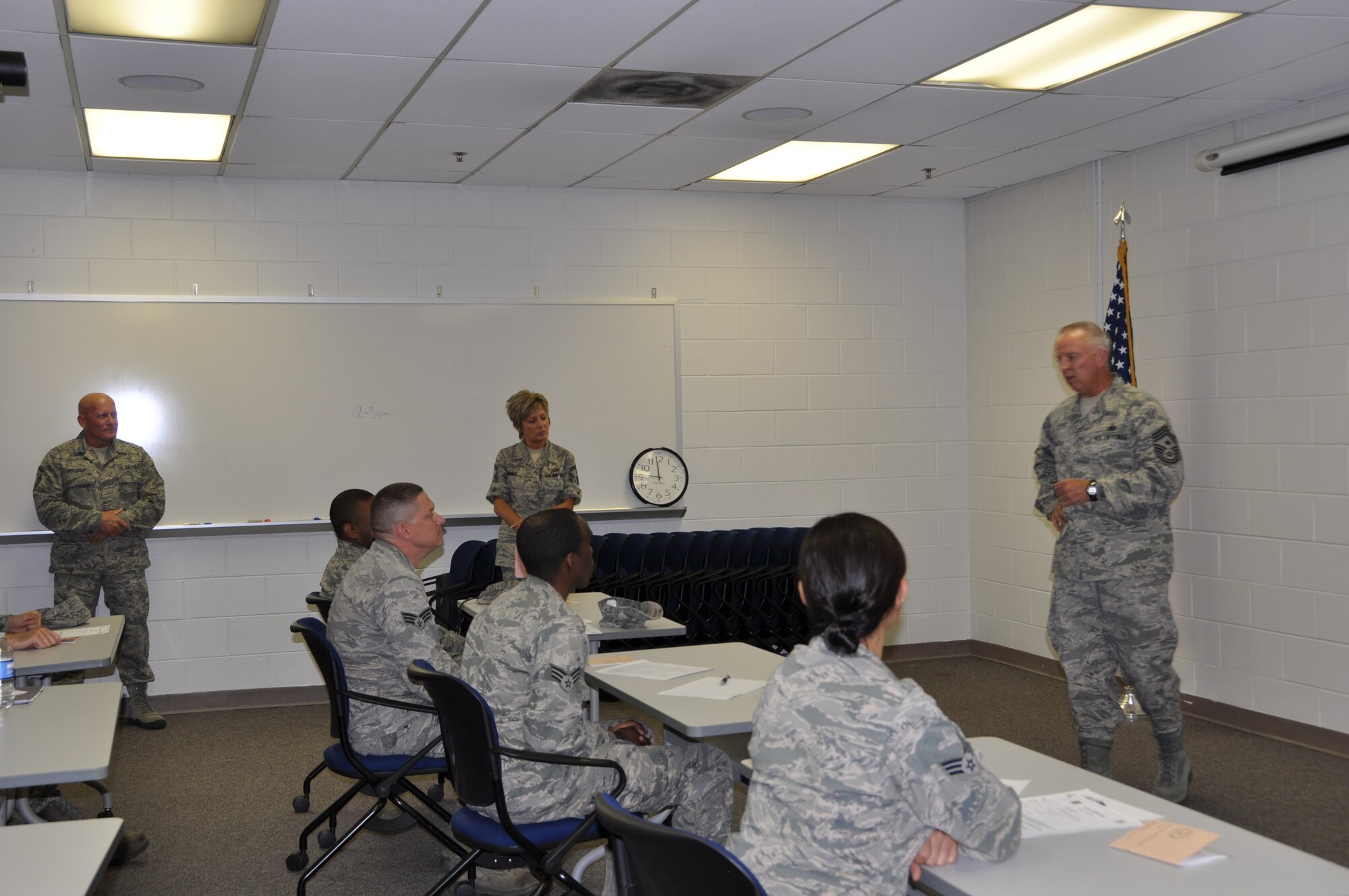 Chief Master Sgt. Wendell L. Peacock, command chief master sergeant of the 94 Airlift Wing, encourages the Airmen at the inagural First Four meeting and challenges NCOs and SNCOs to offer support to our Airmen.  (U.S. Air Force photo/Airman 1st Class Elizabeth Gaston)