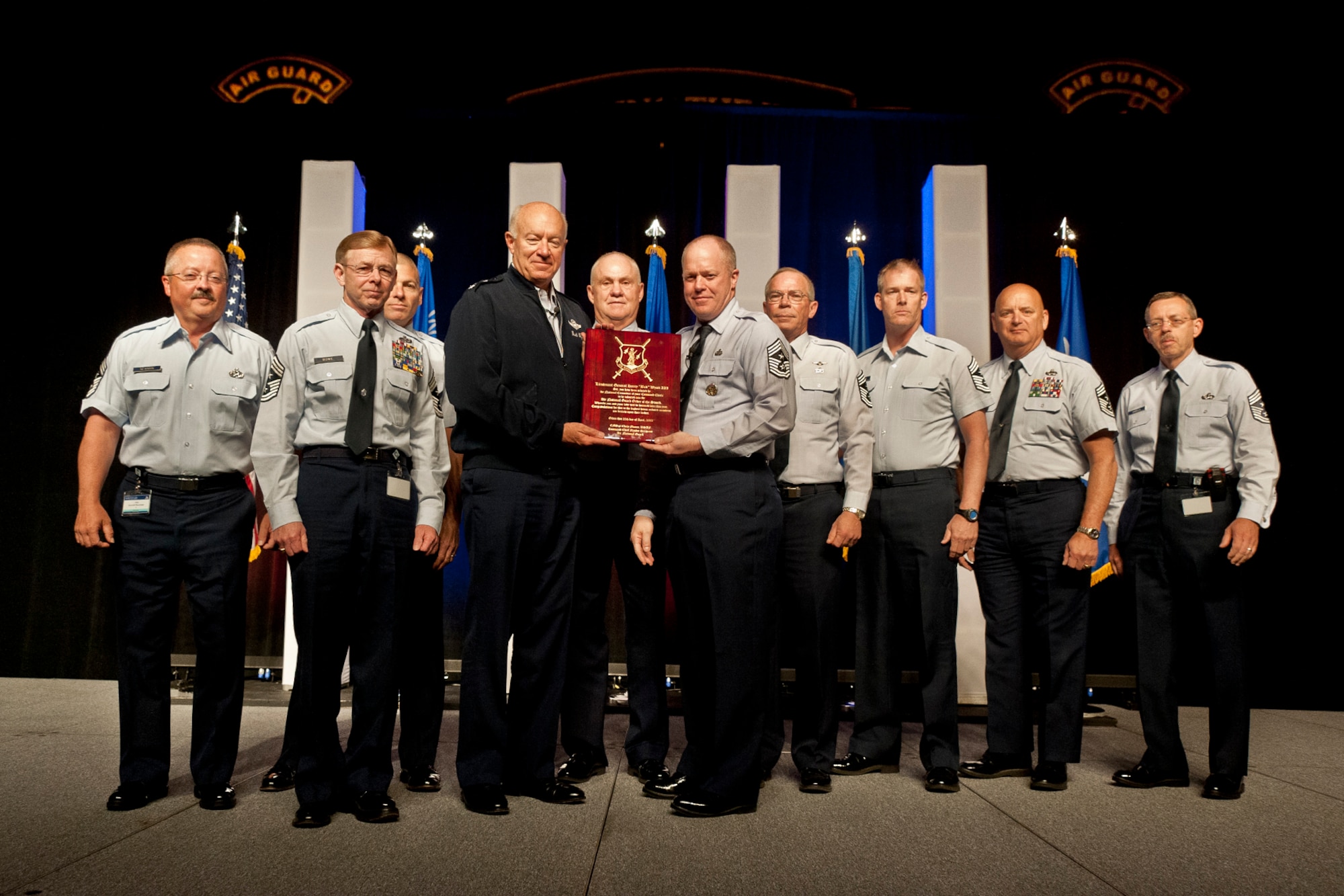 Lt. Gen. Harry M. Wyatt III, the director of the Air National Guard is presented with the Order of the Sword by Chief Master Sgt. Christopher Muncy, Command Chief of the Air National Guard during the Director's Adjutants General Luncheon at the Executive Safety Summit in Milwaukee, Wis. April 24, 2012. 

The Air National Guard Safety Directorate is facilitating its annual ESS covering safety and many other critical topics for all executive leadership for the ANG. (National Guard Photo by Master Sgt. Marvin Preston/RELEASED)