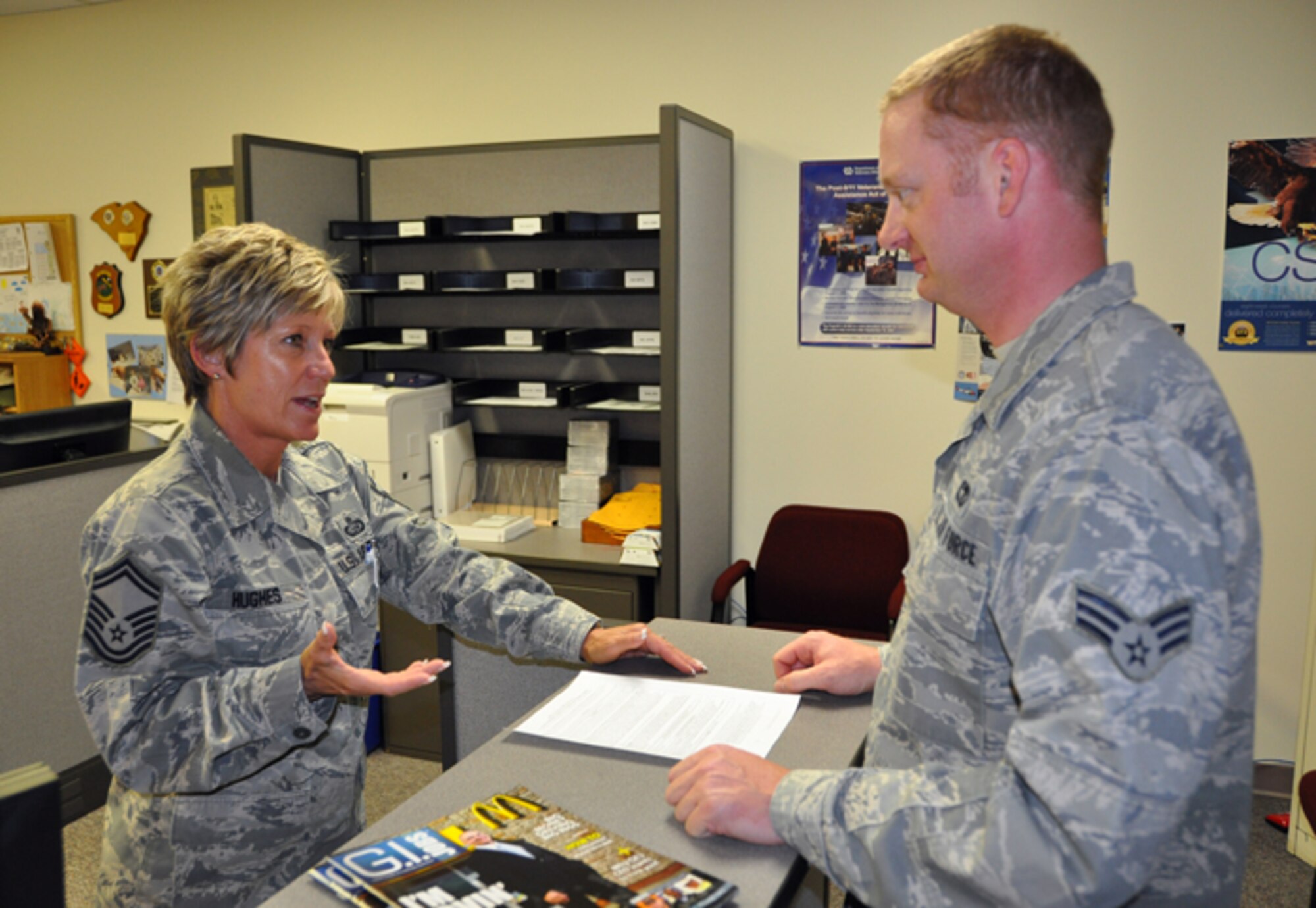 Senior Master Sgt. Joy E. Hughes, chief of education and training for the 94 Airlift Wing, mentors Senior Airman Cameron C. Janzen, 94th Airlift Wing honor guard member.  Hughes is the current president of the Dobbins Top Three and will likely be among those called upon to mentor members of the First Four.  (U.S. Air Force photo/Airman 1st Class Elizabeth Gaston)