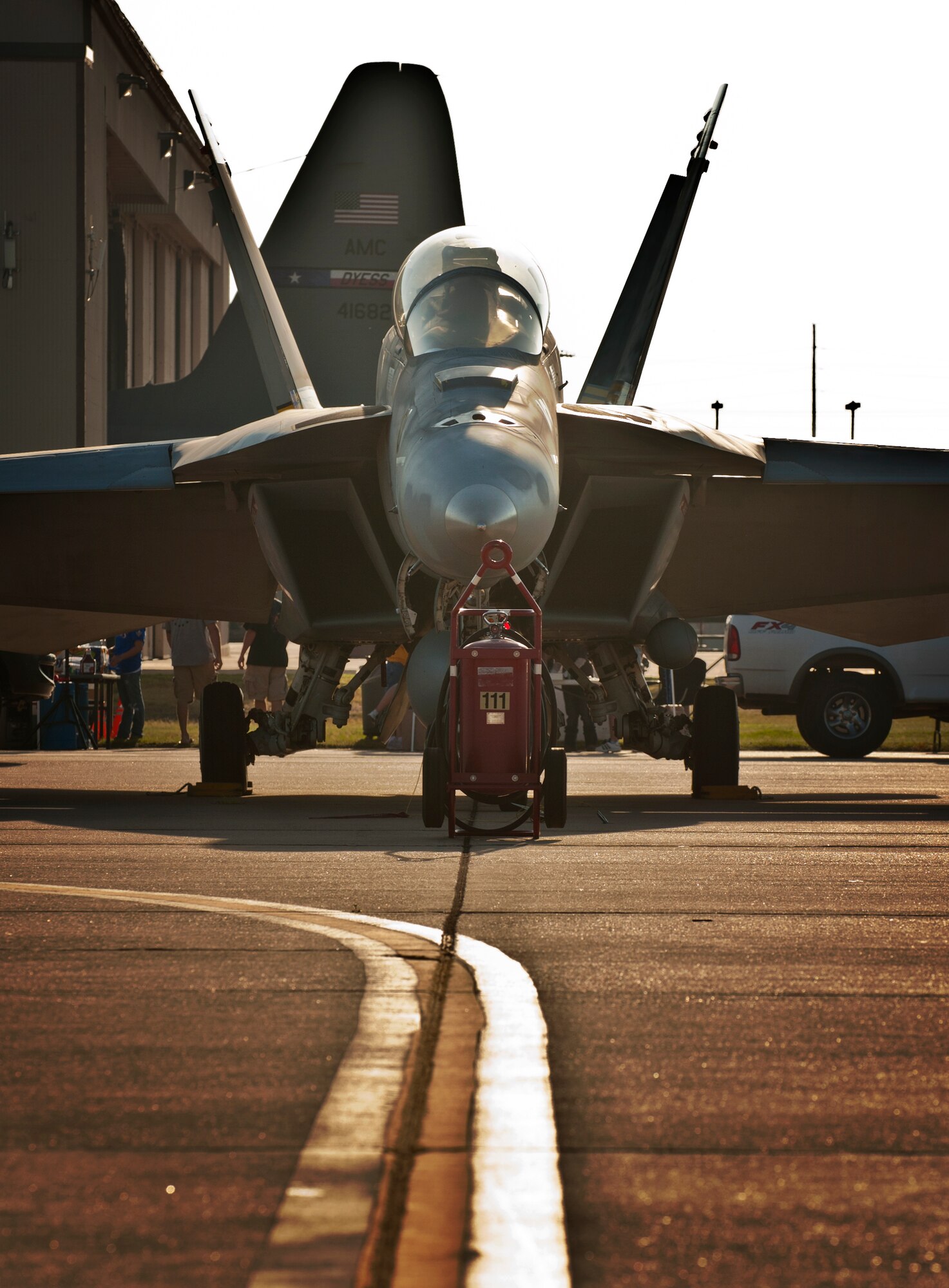 An F-18 Hornet sits on display during the Dyess Big Country Airfest April 28, 2012, at Dyess Air Force Base, Texas. An F-18 is capable of reaching speeds over 1,200 miles per hour and can weigh up to 36,970 pounds when loaded with armaments. (U.S. Air Force photo by Airman 1st Class Jonathan Stefanko/ Released)