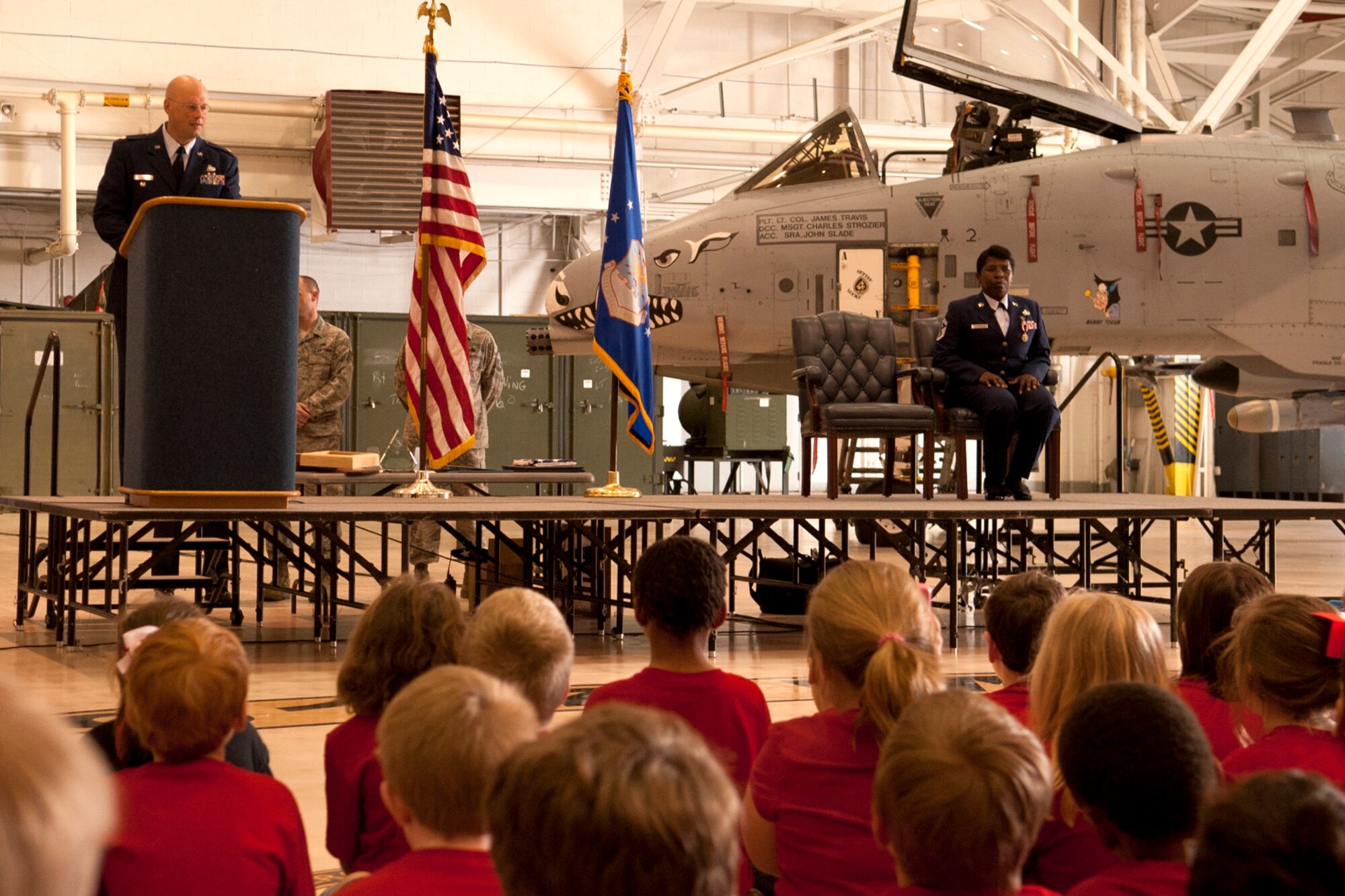 Students from the Phoenix Magnet Elementary School attend the retirement ceremony for one of their teachers, U.S. Air Force Senior Master Sgt. Margaret Maffett, Barksdale Air Force Base, La., April 27, 2012. Maffett is the 917th Aircraft Maintenance Squadron first sergeant and is retiring from the Air Force Reserve after more than 30 years of service. (U.S. Air Force photo by Master Sgt. Greg Steele/Released)