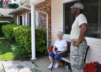 Lucy Harstvedt thanks Staff Sgt. Marcus Capers from Eglin Air Force Base’s 33rd Aircraft Maintenance Squadron as he pauses during a volunteer project April 20 to move her household goods from her longtime home in Shalimar, Fla., to the Bob Hope Village also in Shalimar.  Eight Duke Field and Eglin Airmen answered the call for volunteers to help Harstvedt, widowed since 1964, as she was unable to conduct the move.   Bob Hope Village is a retirement home for surviving spouses of Air Force enlisted members and part of the overall non-profit Air Force Enlisted Village. (U.S. Air Force photo/Dan Neely)